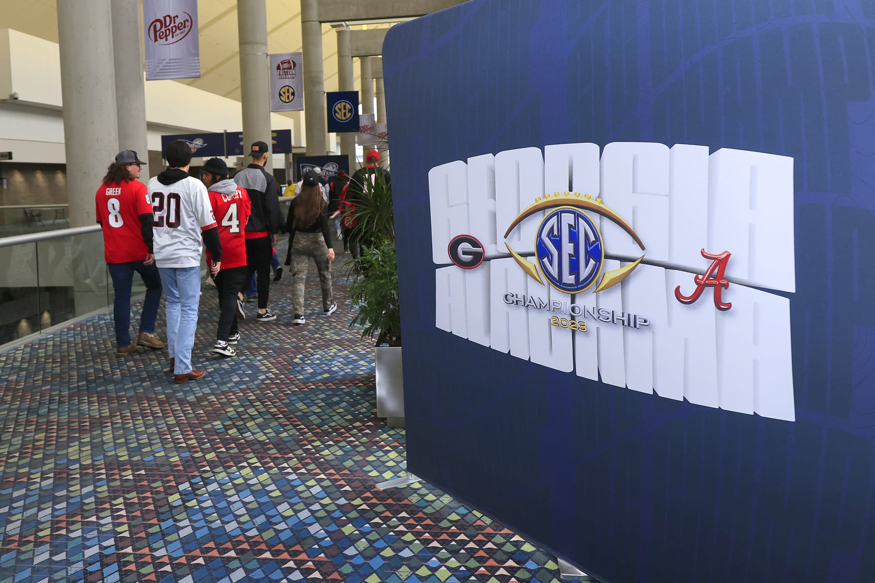 ATLANTA, GA - DECEMBER 02: Fans enjoy the activities at the SEC FanFest presented by Dr. Pepper before the college football SEC Championship game between the Alabama Crimson Tide and the Georgia Bulldogs on December 2, 2023 at the Georgia World Congress Center in Atlanta, GA.  (Photo by David J. Griffin/Icon Sportswire via Getty Images)