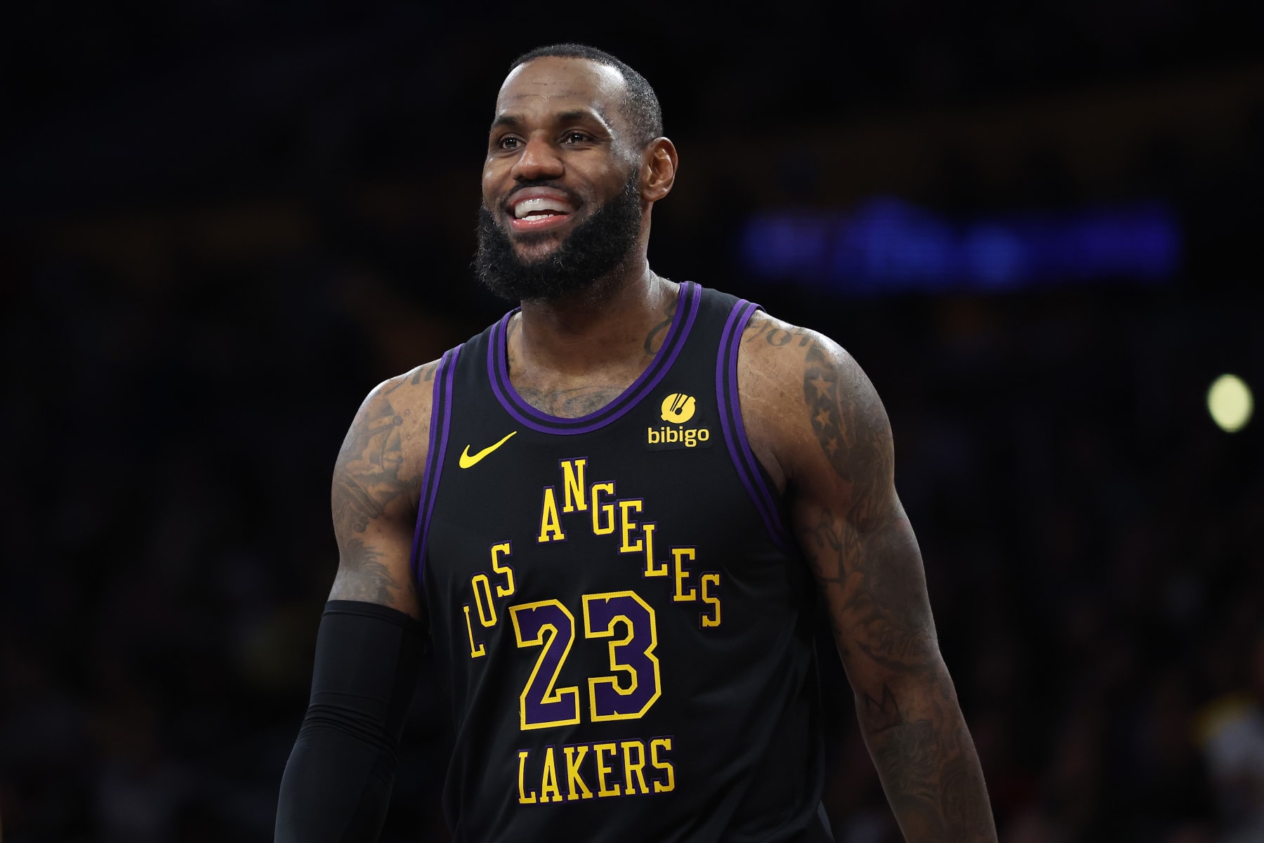 LOS ANGELES, CALIFORNIA - JANUARY 09: LeBron James #23 of the Los Angeles Lakers looks on during the second half of a game against the Toronto Raptors at Crypto.com Arena on January 09, 2024 in Los Angeles, California.  NOTE TO USER: User expressly acknowledges and agrees that, by downloading and or using this photograph, User is consenting to the terms and conditions of the Getty Images License Agreement. (Photo by Sean M. Haffey/Getty Images)