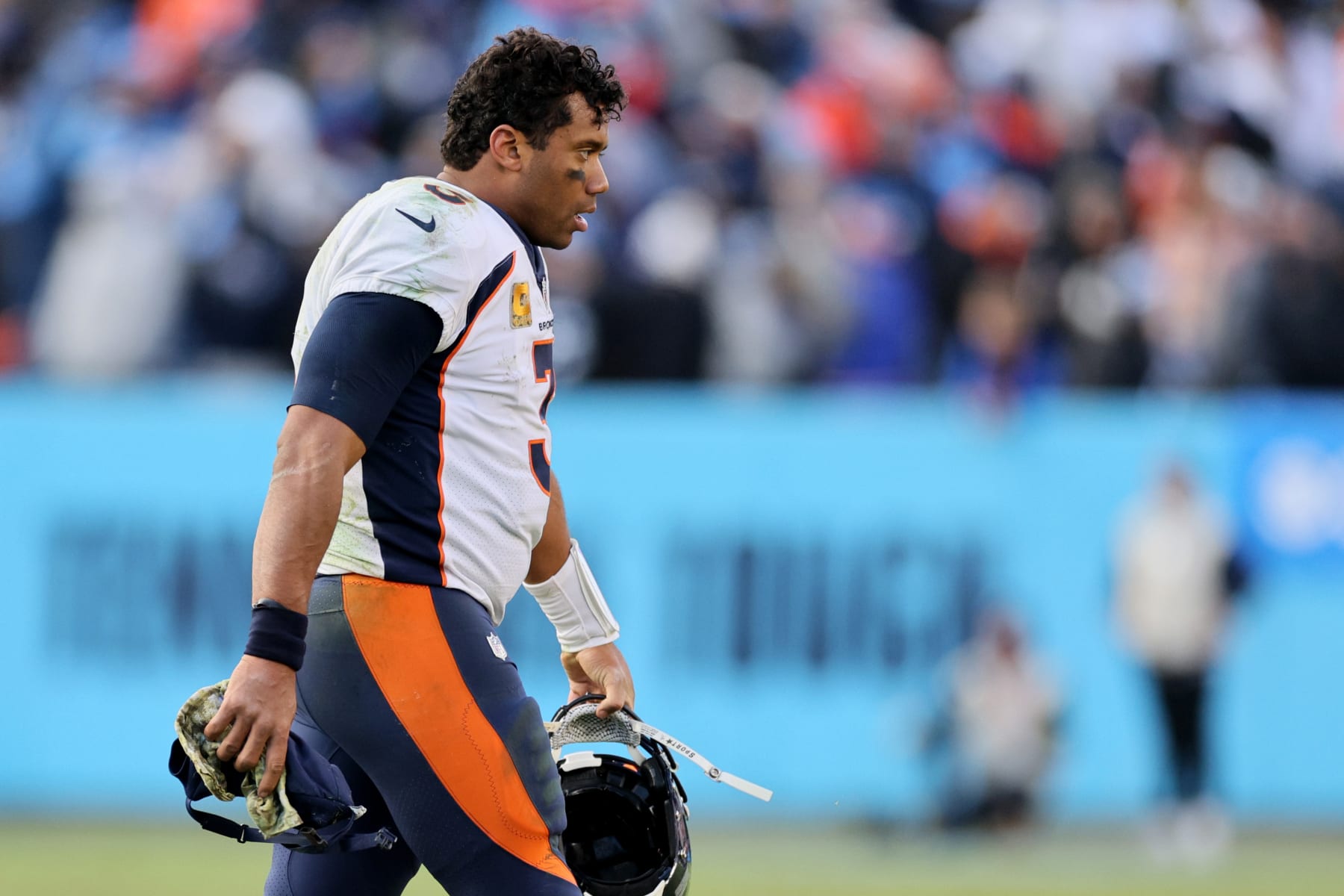 NASHVILLE, TENNESSEE - NOVEMBER 13: Russell Wilson #3 of the Denver Broncos walks off the field after his team's 17-10 loss to Tennessee Titans at Nissan Stadium on November 13, 2022 in Nashville, Tennessee. (Photo by Andy Lyons/Getty Images)