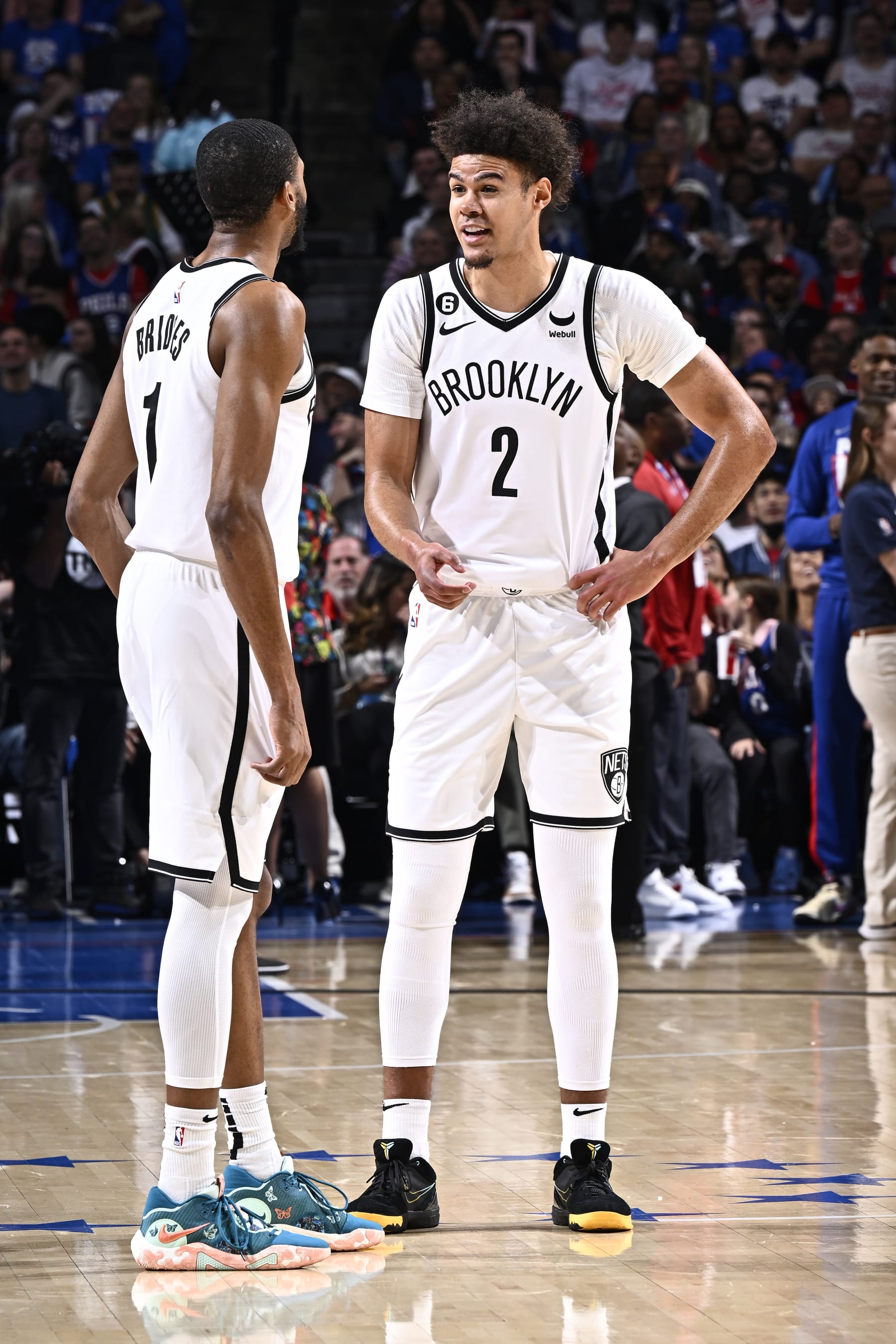 PHILADELPHIA, PA - APRIL 17: Cameron Johnson #2 speaks with Mikal Bridges #1 of the Brooklyn Nets during Round 1 Game 2 of the 2023 NBA Playoffs against the Philadelphia 76ers on April 17, 2023 at the Wells Fargo Center in Philadelphia, Pennsylvania NOTE TO USER: User expressly acknowledges and agrees that, by downloading and/or using this Photograph, user is consenting to the terms and conditions of the Getty Images License Agreement. Mandatory Copyright Notice: Copyright 2023 NBAE (Photo by David Dow/NBAE via Getty Images)