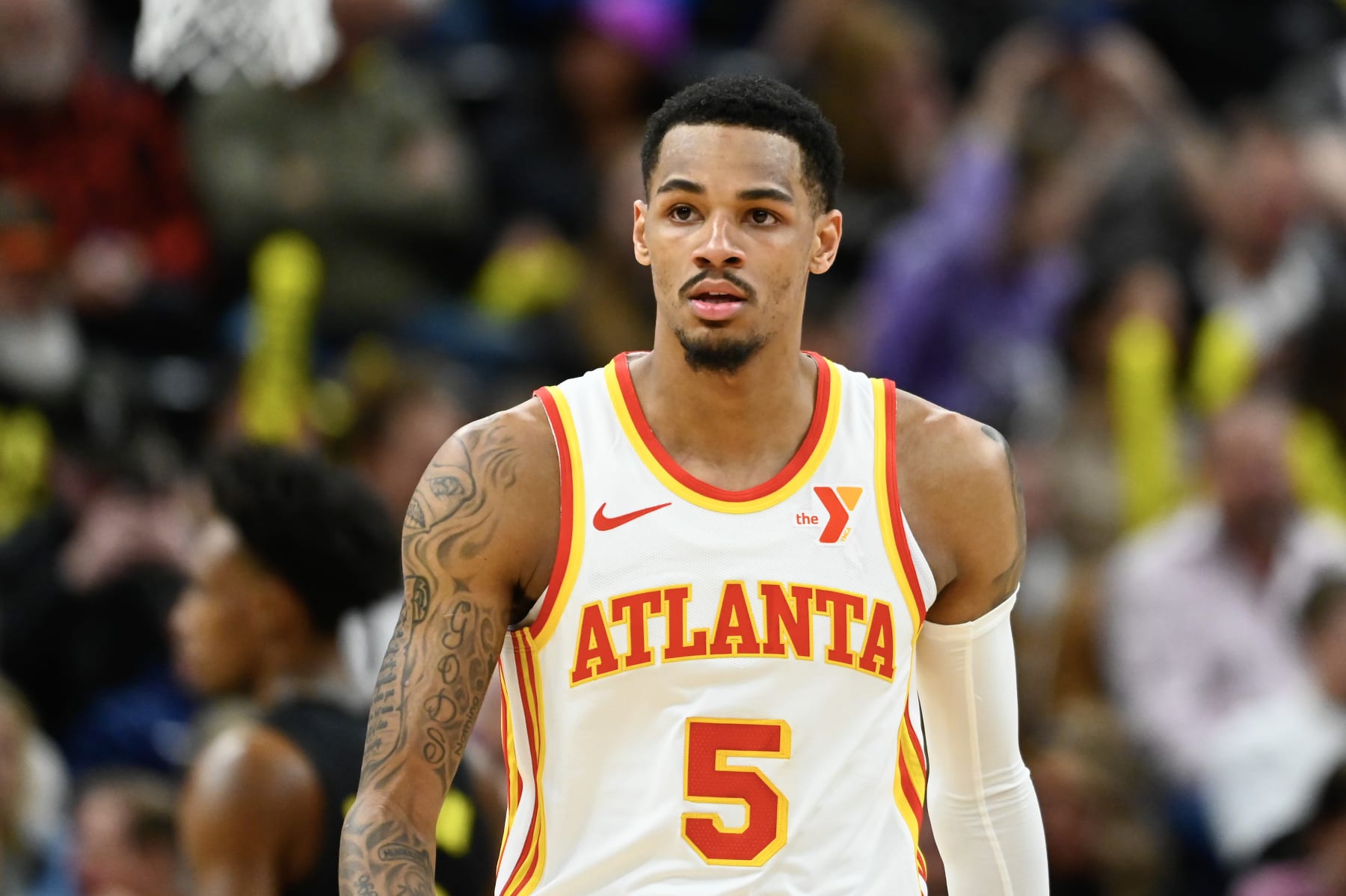 SALT LAKE CITY, UTAH - MARCH 15: Dejounte Murray #5 of the Atlanta Hawks looks on during the second half of a game against the Utah Jazz at Delta Center on March 15, 2024 in Salt Lake City, Utah.  NOTE TO USER: User expressly acknowledges and agrees that, by downloading and or using this photograph, User is consenting to the terms and conditions of the Getty Images License Agreement.  (Photo by Alex Goodlett/Getty Images)