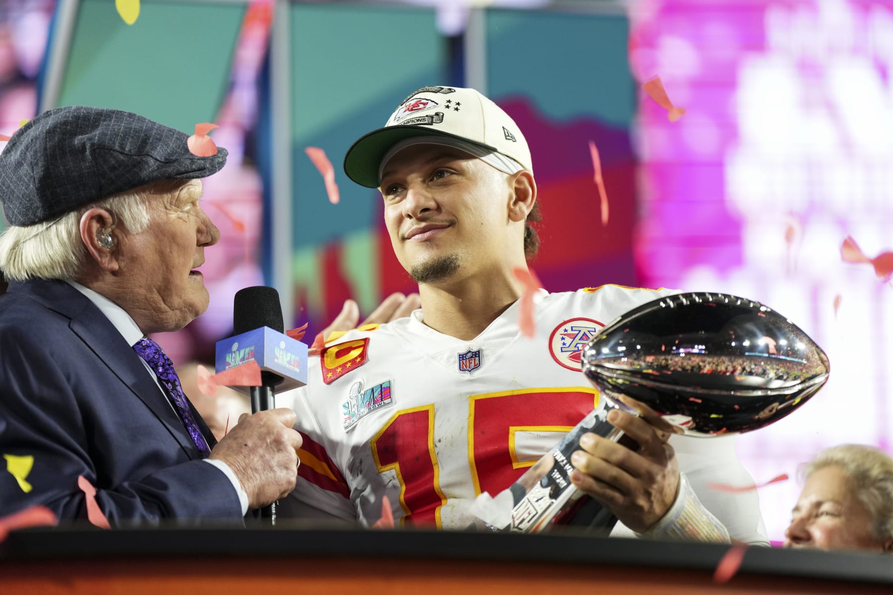 GLENDALE, AZ - FEBRUARY 12: Patrick Mahomes #15 of the Kansas City Chiefs hoists the Lombardi Trophy after Super Bowl LVII against the Philadelphia Eagles at State Farm Stadium on February 12, 2023 in Glendale, Arizona. The Chiefs defeated the Eagles 38-35. (Photo by Cooper Neill/Getty Images)