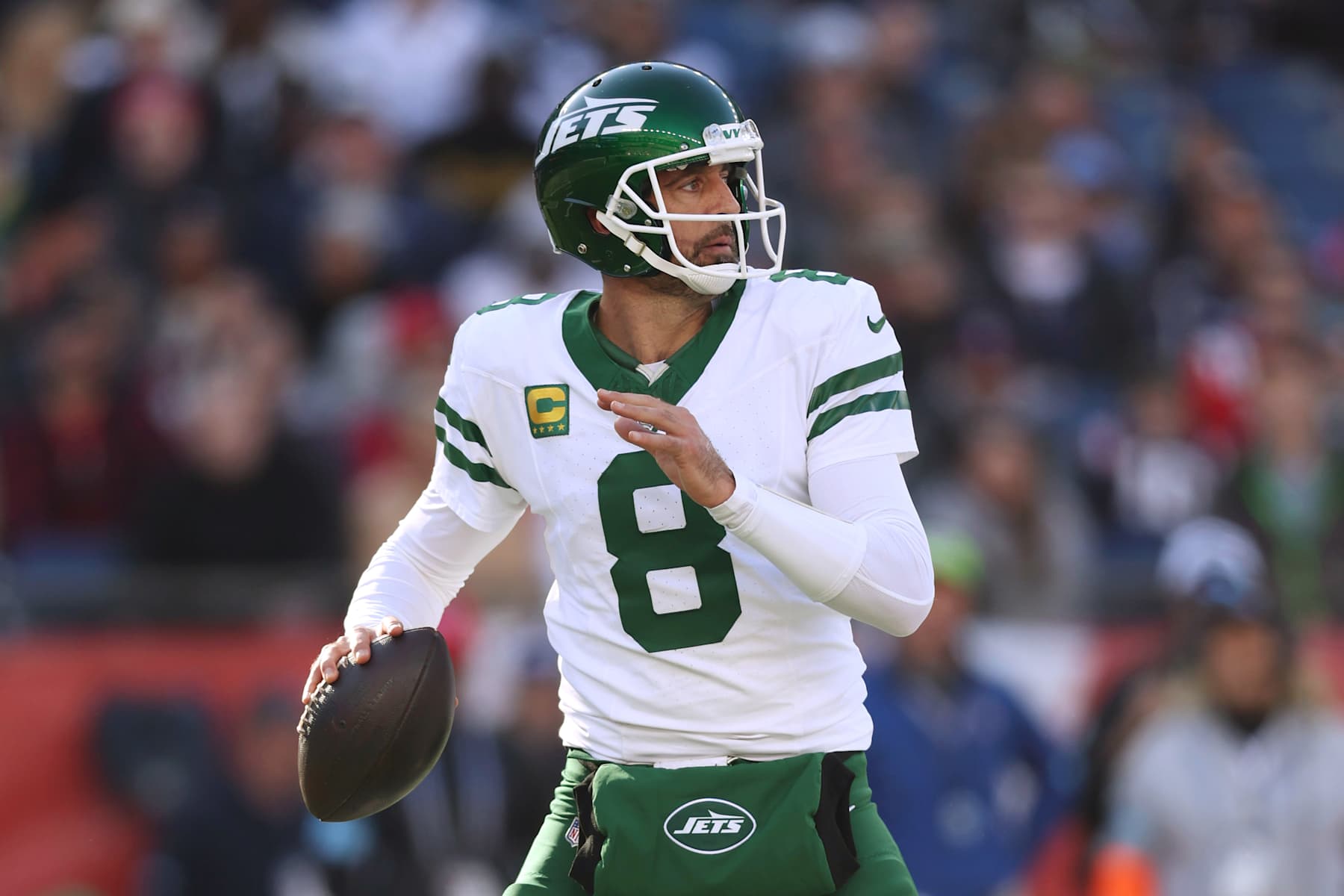 FOXBOROUGH, MASSACHUSETTS - OCTOBER 27: Aaron Rodgers #8 of the New York Jets looks to pass during the game against the New England Patriots at Gillette Stadium on October 27, 2024 in Foxborough, Massachusetts. (Photo by Adam Glanzman/Getty Images)