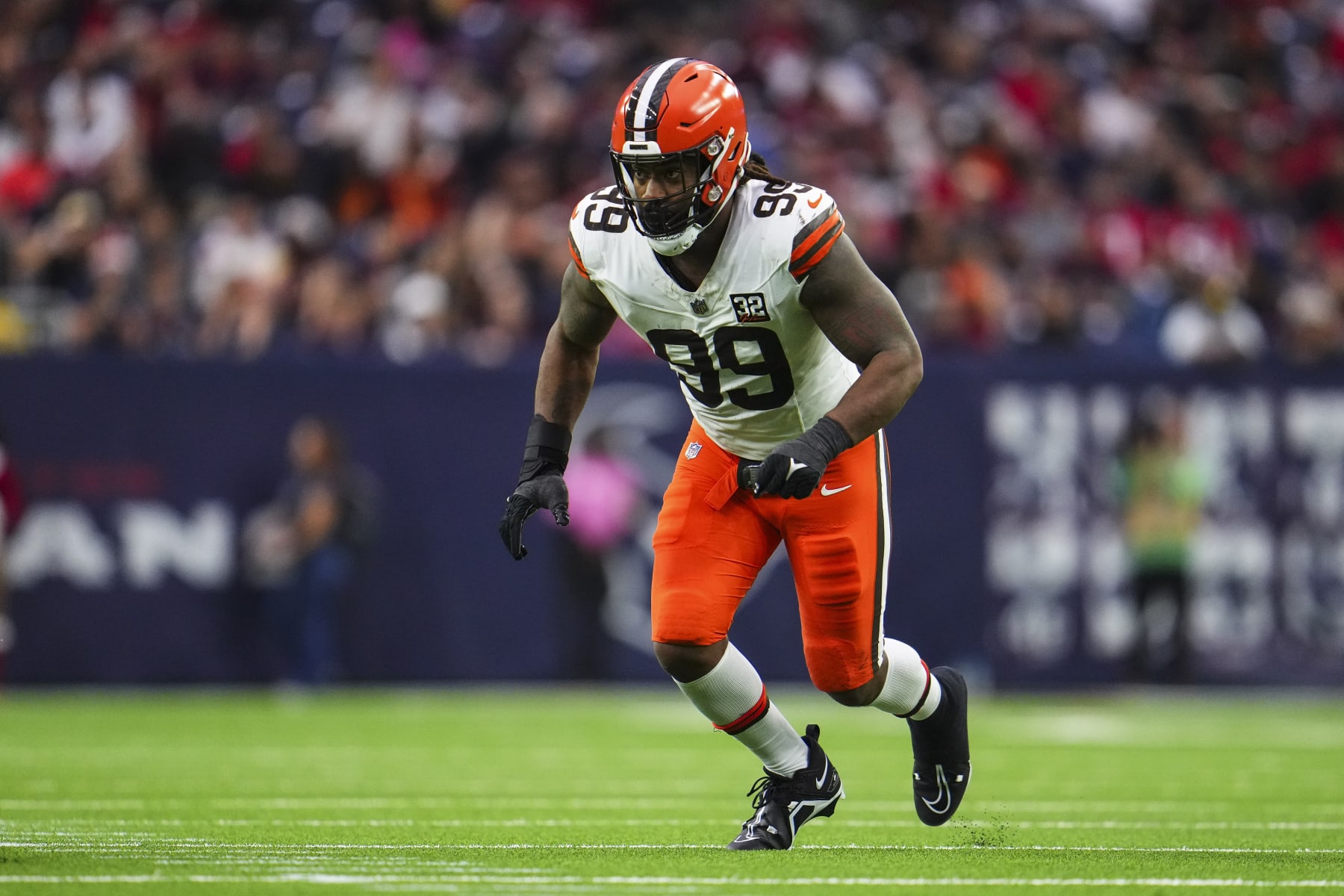 HOUSTON, TX - DECEMBER 24: Za'Darius Smith #99 of the Cleveland Browns rushes the passer during an NFL football game against the Houston Texans at NRG Stadium on December 24, 2023 in Houston, Texas. (Photo by Cooper Neill/Getty Images)