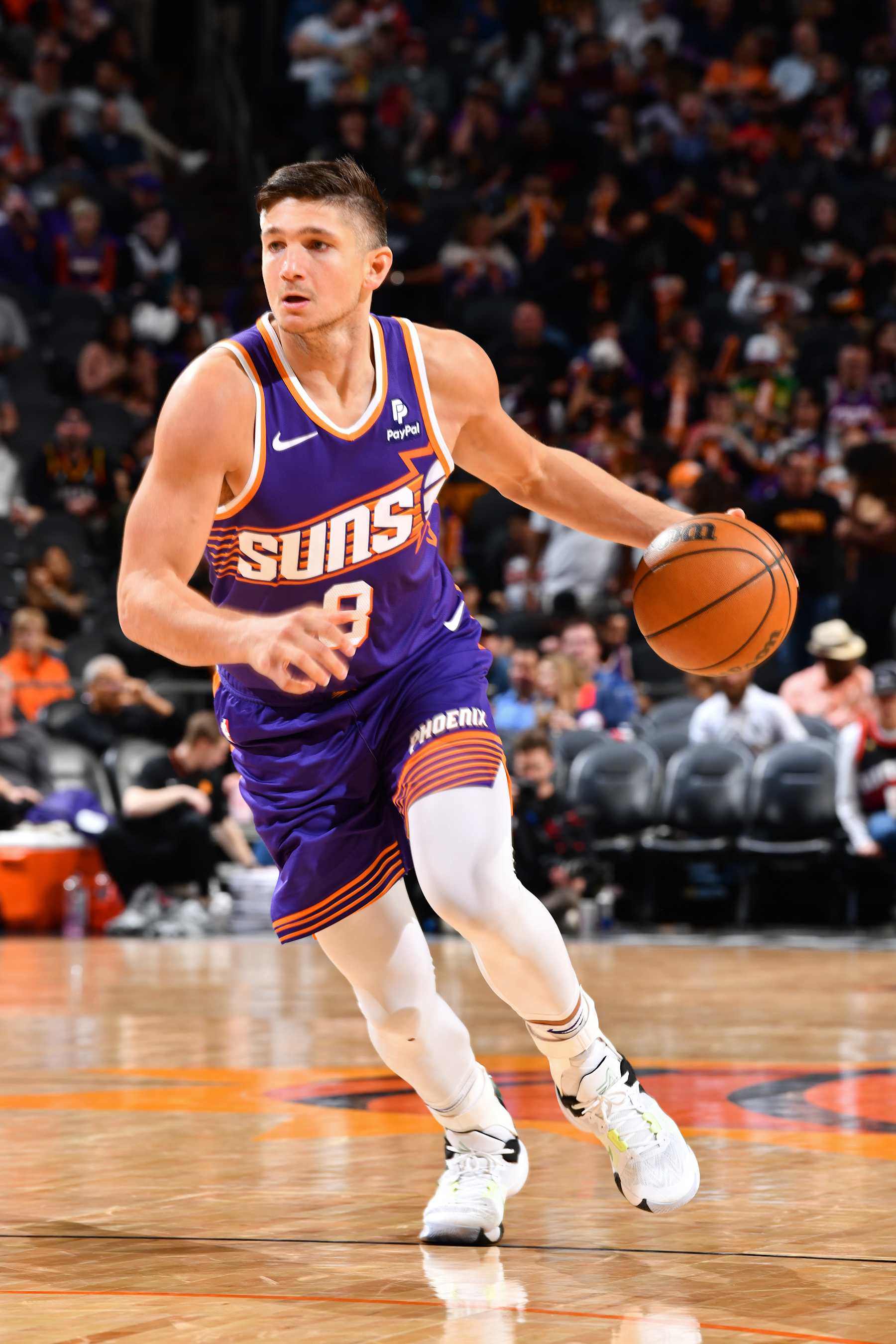 PHOENIX, AZ - MARCH 2: Grayson Allen #8 of the Phoenix Suns dribbles the ball during the game against the Houston Rockets on March 2, 2024 at Footprint Center in Phoenix, Arizona. NOTE TO USER: User expressly acknowledges and agrees that, by downloading and or using this photograph, user is consenting to the terms and conditions of the Getty Images License Agreement. Mandatory Copyright Notice: Copyright 2024 NBAE (Photo by Barry Gossage/NBAE via Getty Images)