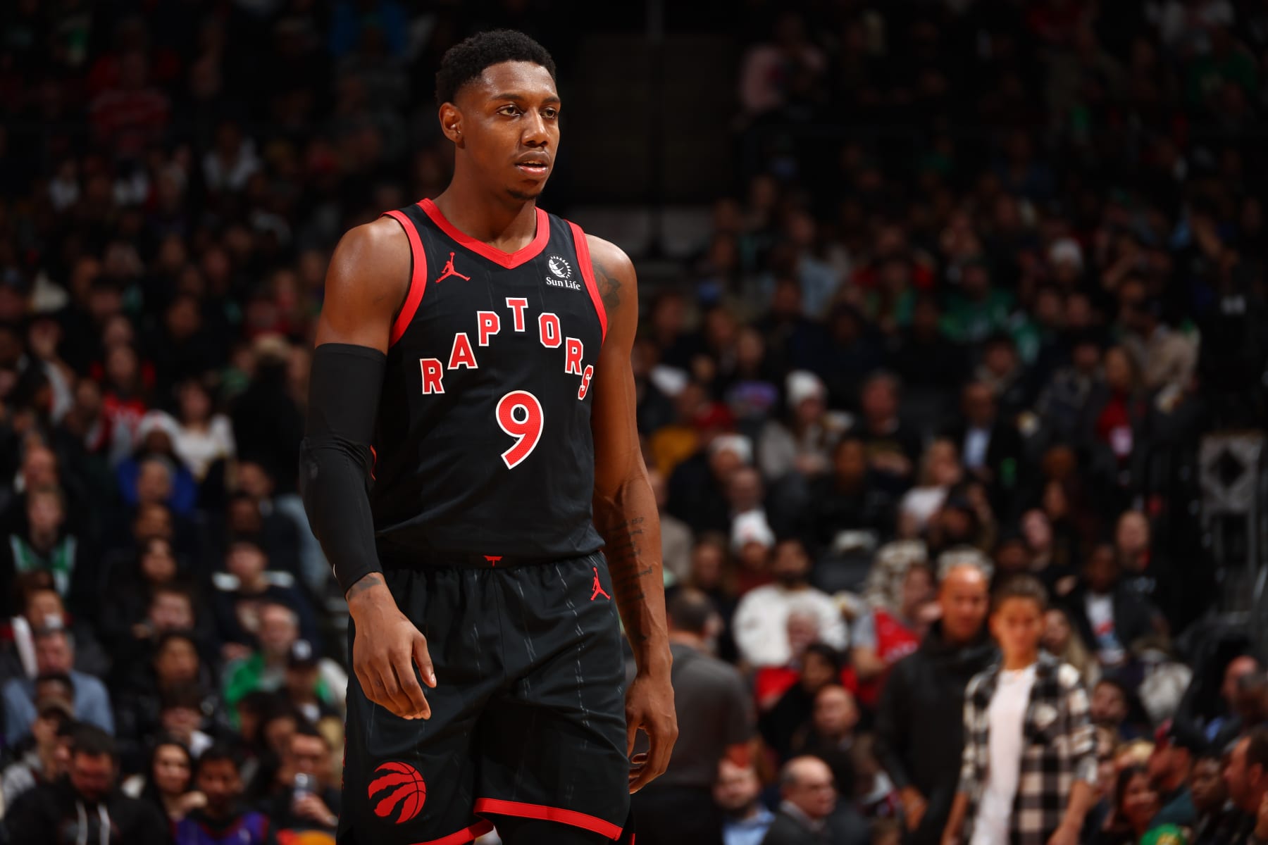TORONTO, CANADA - JANUARY 15:  RJ Barrett #9 of the Toronto Raptors looks on during the game against the Boston Celtics on January 15, 2024 at the Scotiabank Arena in Toronto, Ontario, Canada.  NOTE TO USER: User expressly acknowledges and agrees that, by downloading and or using this Photograph, user is consenting to the terms and conditions of the Getty Images License Agreement.  Mandatory Copyright Notice: Copyright 2024 NBAE (Photo by Vaughn Ridley/NBAE via Getty Images)