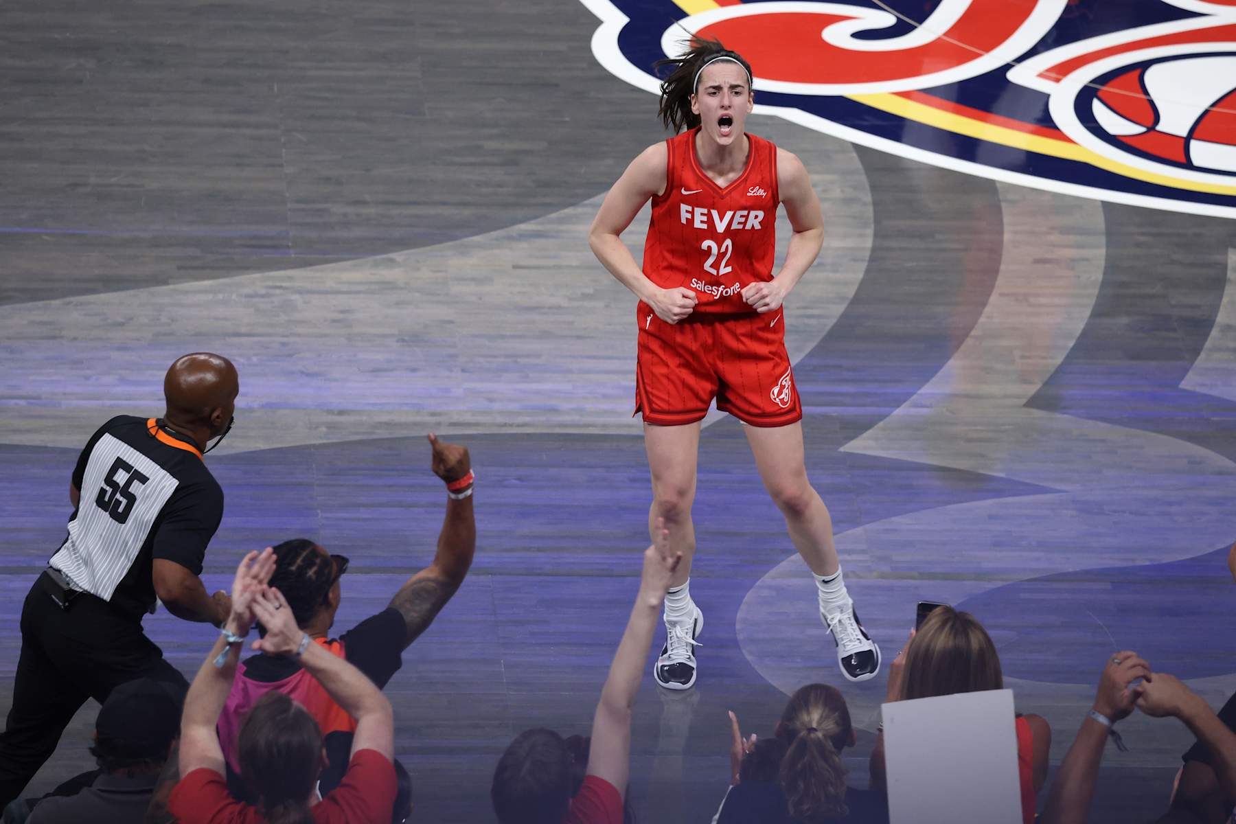 INDIANAPOLIS, IN - AUGUST 16: Indiana Fever guard Caitlin Clark (22) reacts to making a 3 point shot against the Phoenix Mercury at Gainbridge Fieldhouse on August 16, 2024 in Indianapolis, Indiana. (Photo by Brian Spurlock/Icon Sportswire via Getty Images)