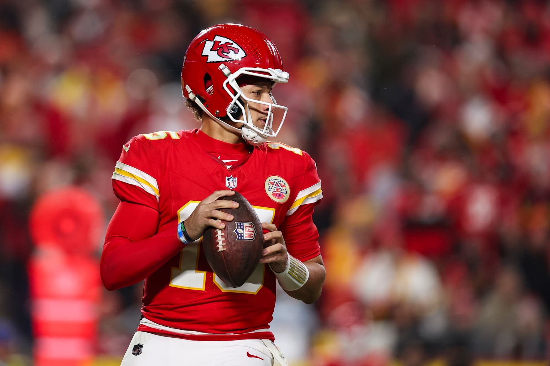 KANSAS CITY, MISSOURI - DECEMBER 08: Patrick Mahomes #15 of the Kansas City Chiefs drops back to pass during an NFL football game against the Los Angeles Chargers at GEHA Field at Arrowhead Stadium on December 8, 2024 in Kansas City, Missouri. (Photo by Perry Knotts/Getty Images)