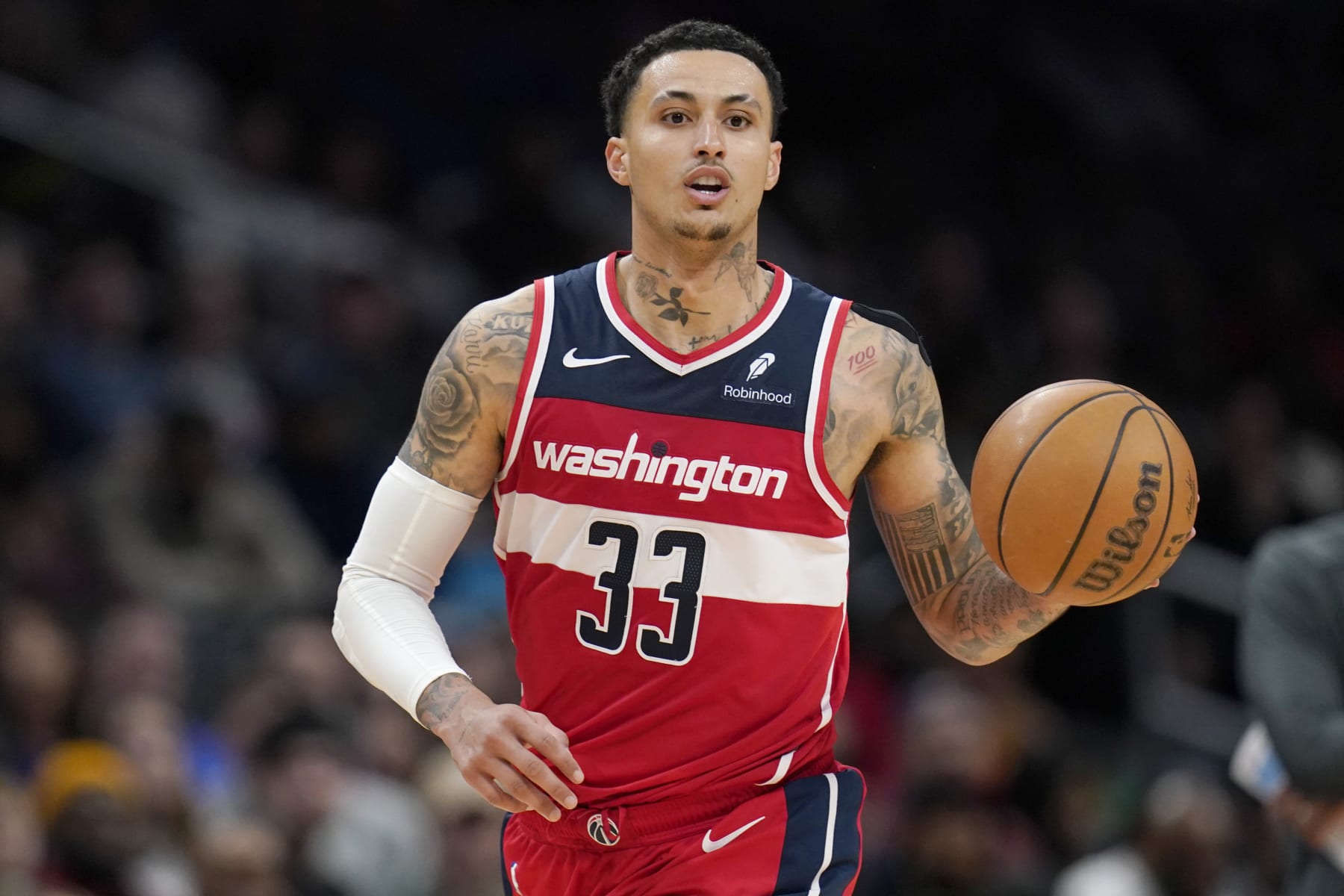 WASHINGTON, DC - MARCH 29: Kyle Kuzma #33 of the Washington Wizards dribbles the ball down the court during the second half against the Detroit Pistons at Capital One Arena on March 29, 2024 in Washington, DC. NOTE TO USER: User expressly acknowledges and agrees that, by downloading and or using this photograph, User is consenting to the terms and conditions of the Getty Images License Agreement. (Photo by Jess Rapfogel/Getty Images)