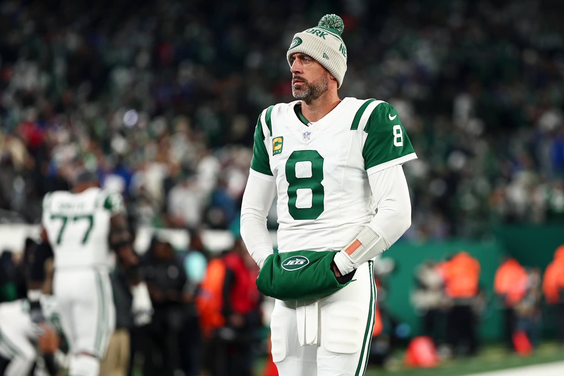 EAST RUTHERFORD, NEW JERSEY - OCTOBER 14: Aaron Rodgers #8 of the New York Jets stands on the sidelines prior to an NFL game against the Buffalo Bills at MetLife Stadium on October 14, 2024 in East Rutherford, New Jersey. (Photo by Kevin Sabitus/Getty Images)