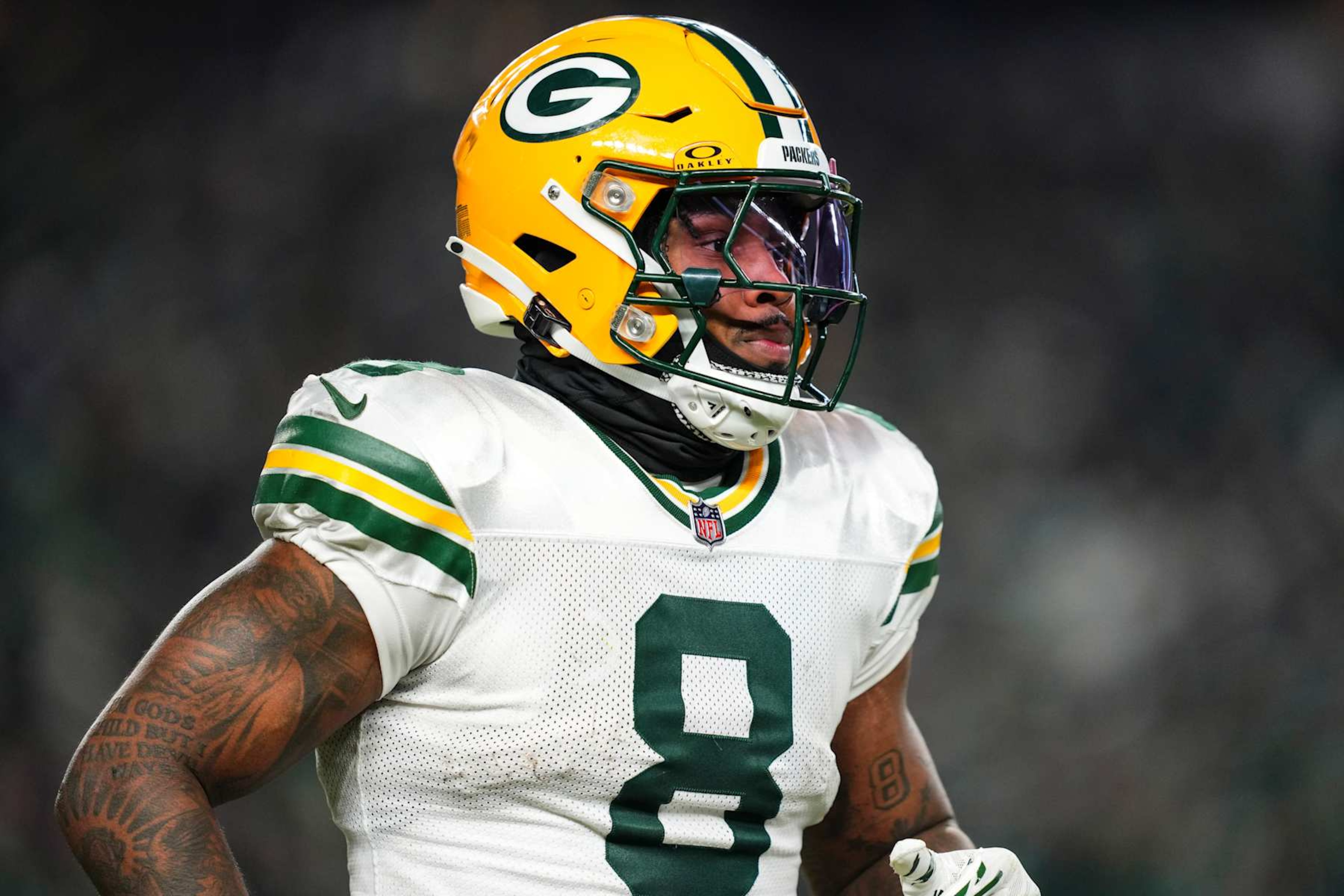 PHILADELPHIA, PA - JANUARY 12: Josh Jacobs #8 of the Green Bay Packers looks on from the field during an NFL football wild card playoff game against the Philadelphia Eagles at Lincoln Financial Field on January 12, 2025 in Philadelphia, Pennsylvania. (Photo by Cooper Neill/Getty Images)
