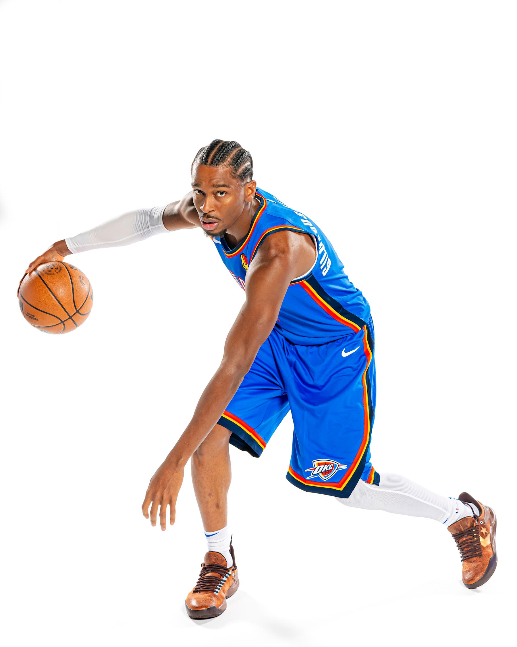 OKLAHOMA CITY, OKLAHOMA - SEPT 30: Shai Gilgeous-Alexander #2 of the Oklahoma City Thunder poses for a portrait during 2024 NBA Media Day on September 30, 2024 at the Paycom Center in Oklahoma City, Oklahoma. NOTE TO USER: User expressly acknowledges and agrees that, by downloading and/or using this Photograph, user is consenting to the terms and conditions of the Getty Images License Agreement. Mandatory Copyright Notice: Copyright 2024 NBAE (Photo by Zach Beeker/NBAE via Getty Images)