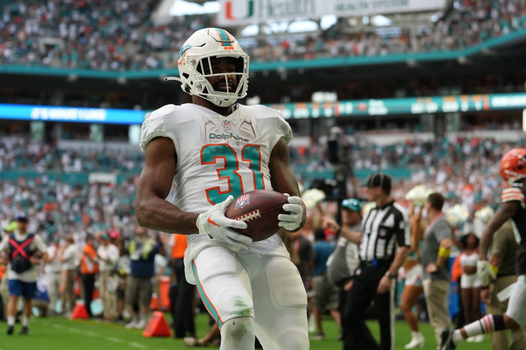 MIAMI GARDENS, FL - NOVEMBER 13: Miami Dolphins running back Raheem Mostert (31) looks toward the stands after scoring a touchdown during the game between the Cleveland Browns and the Miami Dolphins on Sunday, November 13, 2022 at Hard Rock Stadium in Miami Gardens, Fla. (Photo by Peter Joneleit/Icon Sportswire via Getty Images)