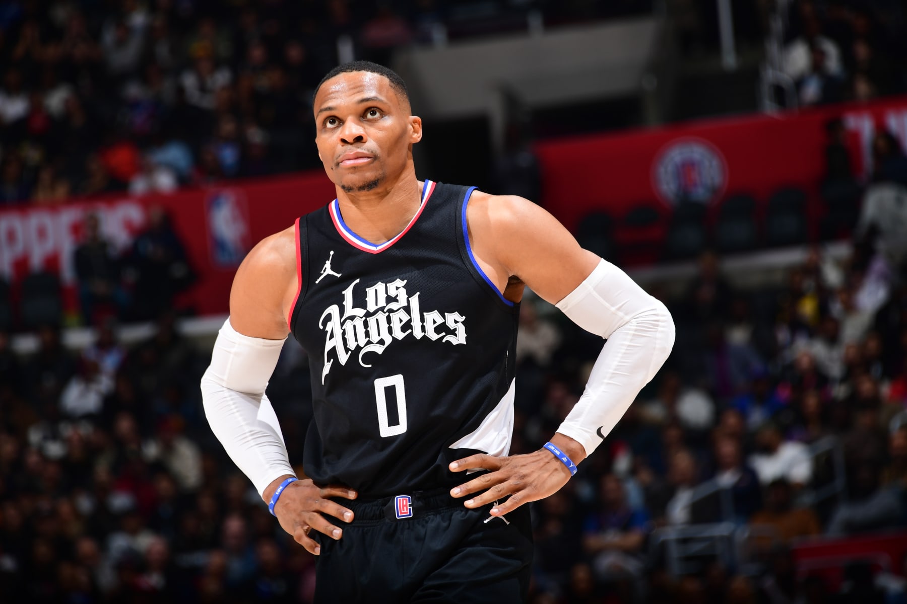 LOS ANGELES, CA - DECEMBER 6: Russell Westbrook #0 of the LA Clippers looks on during the game on December 6, 2023 at Crypto.Com Arena in Los Angeles, California. NOTE TO USER: User expressly acknowledges and agrees that, by downloading and/or using this Photograph, user is consenting to the terms and conditions of the Getty Images License Agreement. Mandatory Copyright Notice: Copyright 2023 NBAE (Photo by Adam Pantozzi/NBAE via Getty Images)