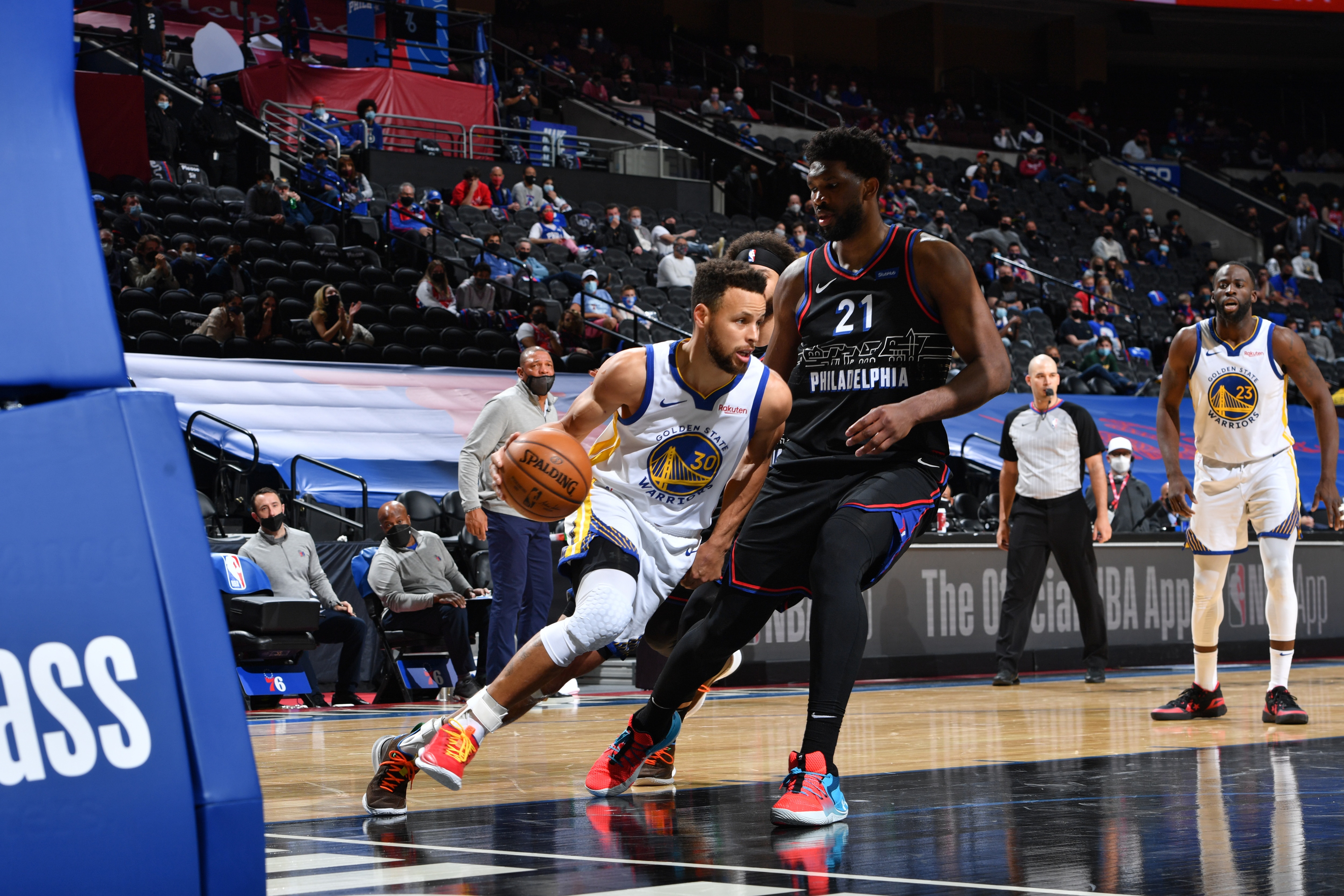 PHILADELPHIA, PA - APRIL 19: Stephen Curry #30 of the Golden State Warriors handles the ball against Joel Embiid #21 of the Philadelphia 76ers on April 19, 2021 at Wells Fargo Center in Philadelphia, Pennsylvania. NOTE TO USER: User expressly acknowledges and agrees that, by downloading and/or using this Photograph, user is consenting to the terms and conditions of the Getty Images License Agreement. Mandatory Copyright Notice: Copyright 2021 NBAE (Photo by Jesse D. Garrabrant/NBAE via Getty Images)