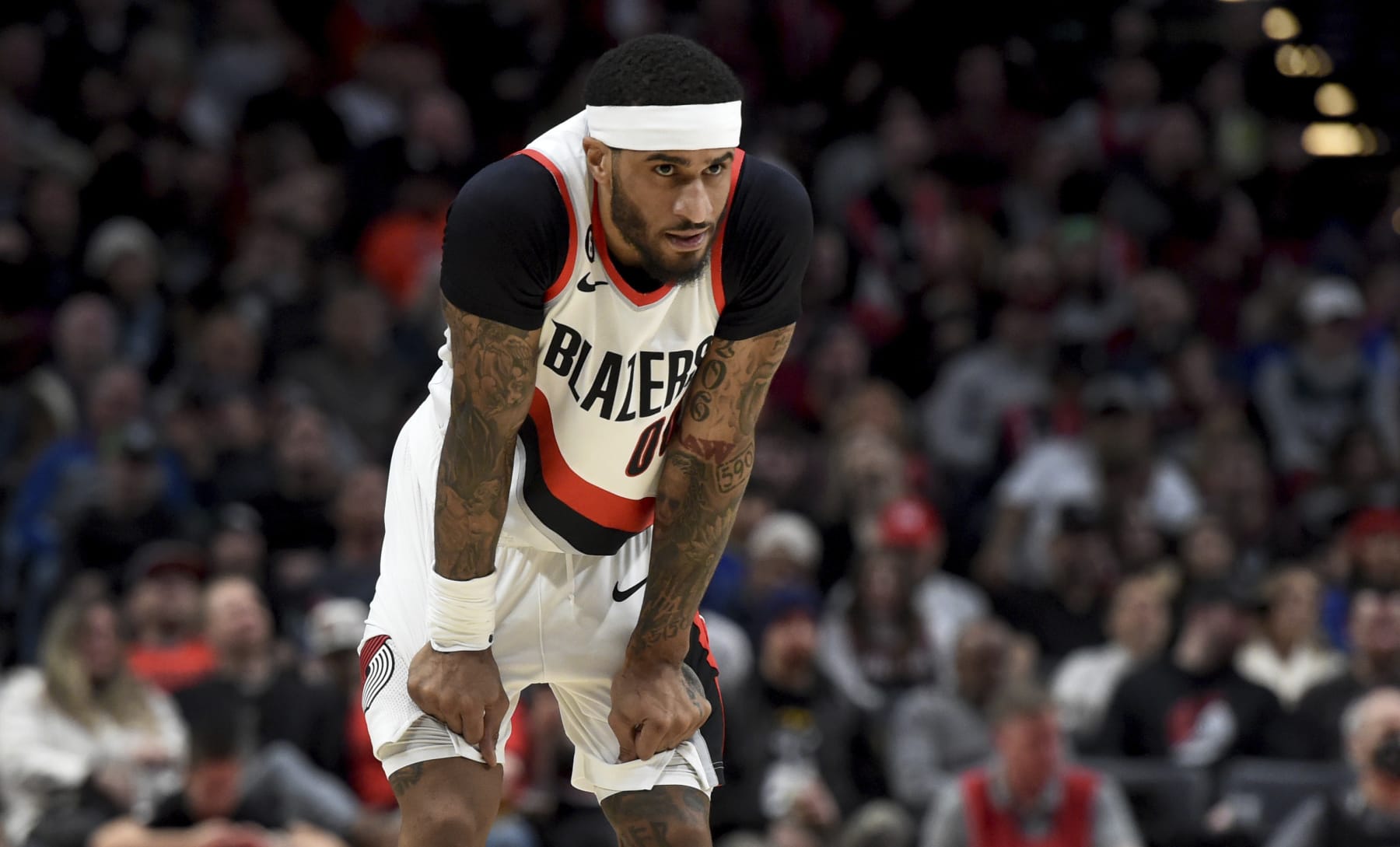 Portland Trail Blazers guard Gary Payton II looks on during the second half of an NBA basketball game against the Detroit Pistons in Portland, Ore., Monday, Jan. 2, 2023. It was Payton's first game of the year after fighting injuries. Payton underwent abdominal surgery in the offseason and initially hoped to be ready for the start of the regular season.The Blazers won 135-106. (AP Photo/Steve Dykes)