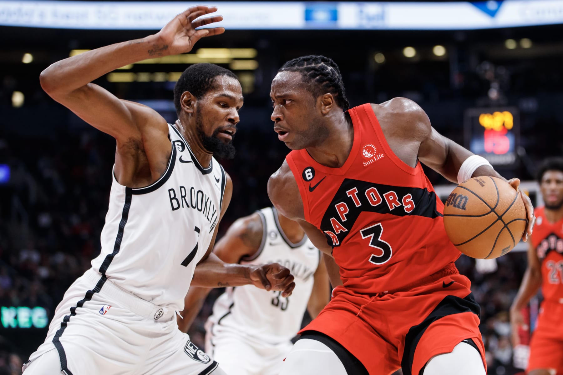 TORONTO, ON - NOVEMBER 23: O.G. Anunoby #3 of the Toronto Raptors drives to the net against Kevin Durant #7 of the Brooklyn Nets during the second half of their NBA game at Scotiabank Arena on November 23, 2022 in Toronto, Canada. NOTE TO USER: User expressly acknowledges and agrees that, by downloading and or using this photograph, User is consenting to the terms and conditions of the Getty Images License Agreement. (Photo by Cole Burston/Getty Images)