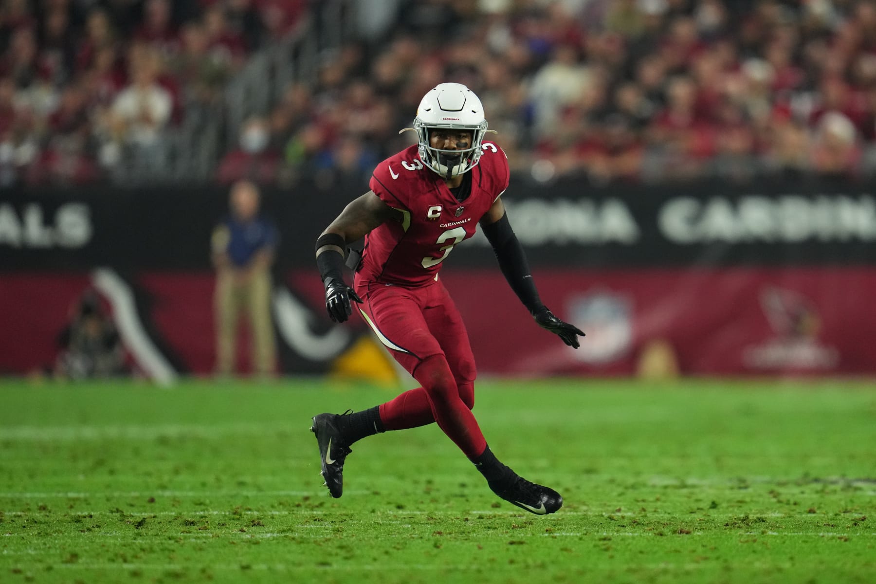 GLENDALE, ARIZONA - DECEMBER 13: Budda Baker #3 of the Arizona Cardinals defends against the Los Angeles Rams during an NFL game at State Farm Stadium on December 13, 2021 in Glendale, Arizona. (Photo by Cooper Neill/Getty Images)