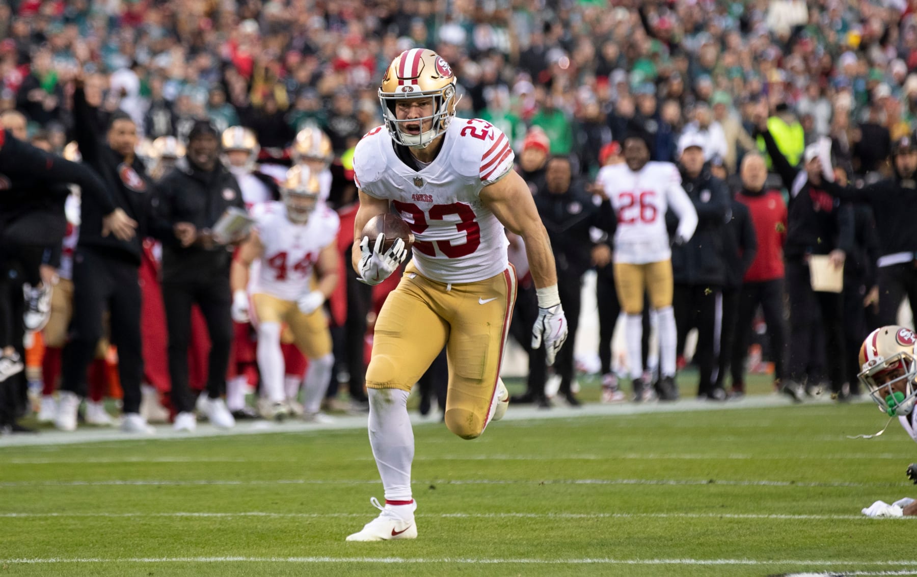 PHILADELPHIA, PA - JANUARY 29: Christian McCaffrey #23 of the San Francisco 49ers rushes for a 23-yard touchdown during the NFC Championship playoff game against the Philadelphia Eagles at Lincoln Financial Field on January 29, 2023 in Philadelphia, Pennsylvania. The Eagles defeated the 49ers 31-7. (Photo by Michael Zagaris/San Francisco 49ers/Getty Images)