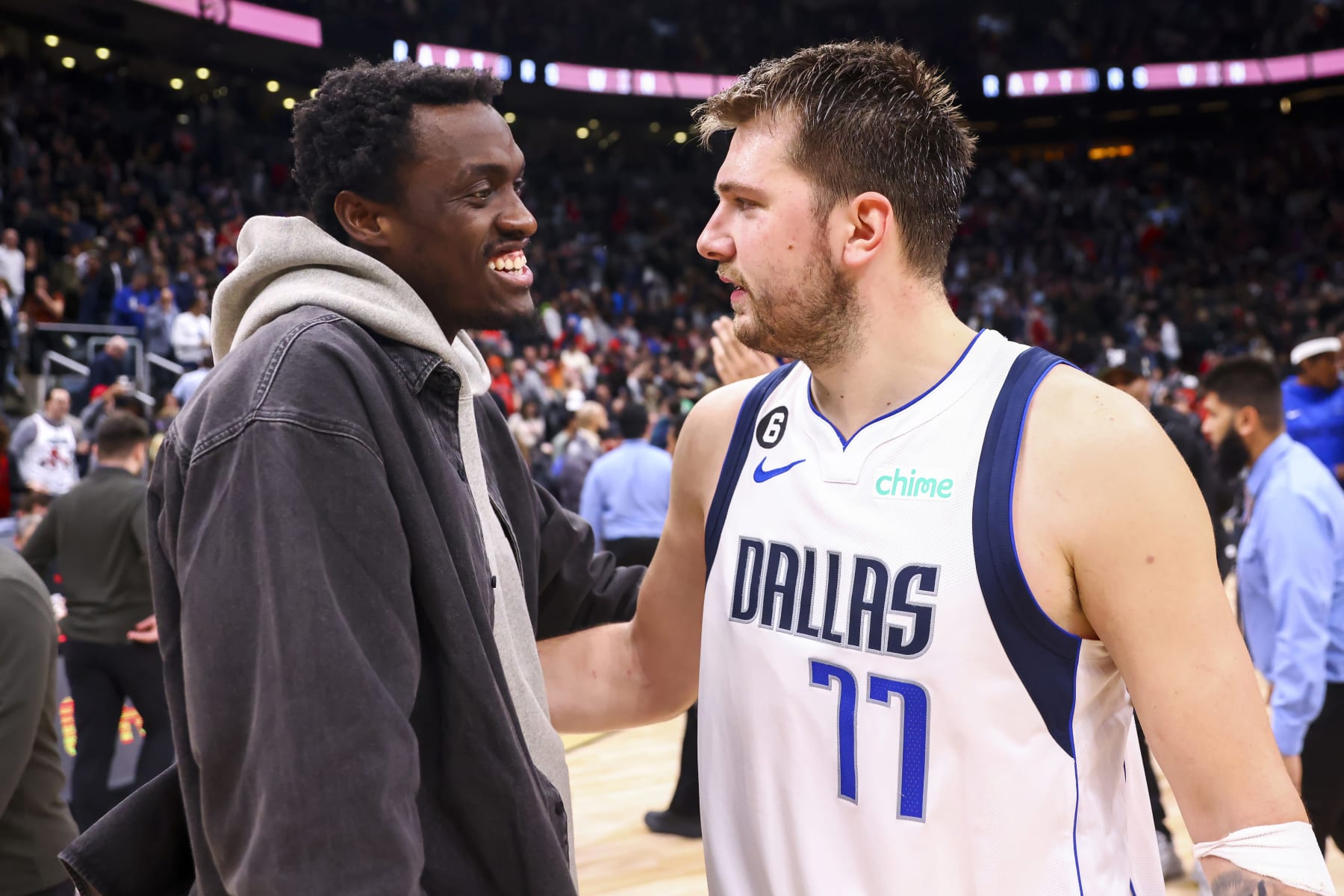 TORONTO, CANADA - NOVEMBER 26: Pascal Siakam #43 of the Toronto Raptors and Luka Doncic #77 of the Dallas Mavericks on the court talking after the game on November 26, 2022 at the Scotiabank Arena in Toronto, Ontario, Canada.  NOTE TO USER: User expressly acknowledges and agrees that, by downloading and or using this Photograph, user is consenting to the terms and conditions of the Getty Images License Agreement.  Mandatory Copyright Notice: Copyright 2022 NBAE (Photo by Vaughn Ridley/NBAE via Getty Images)