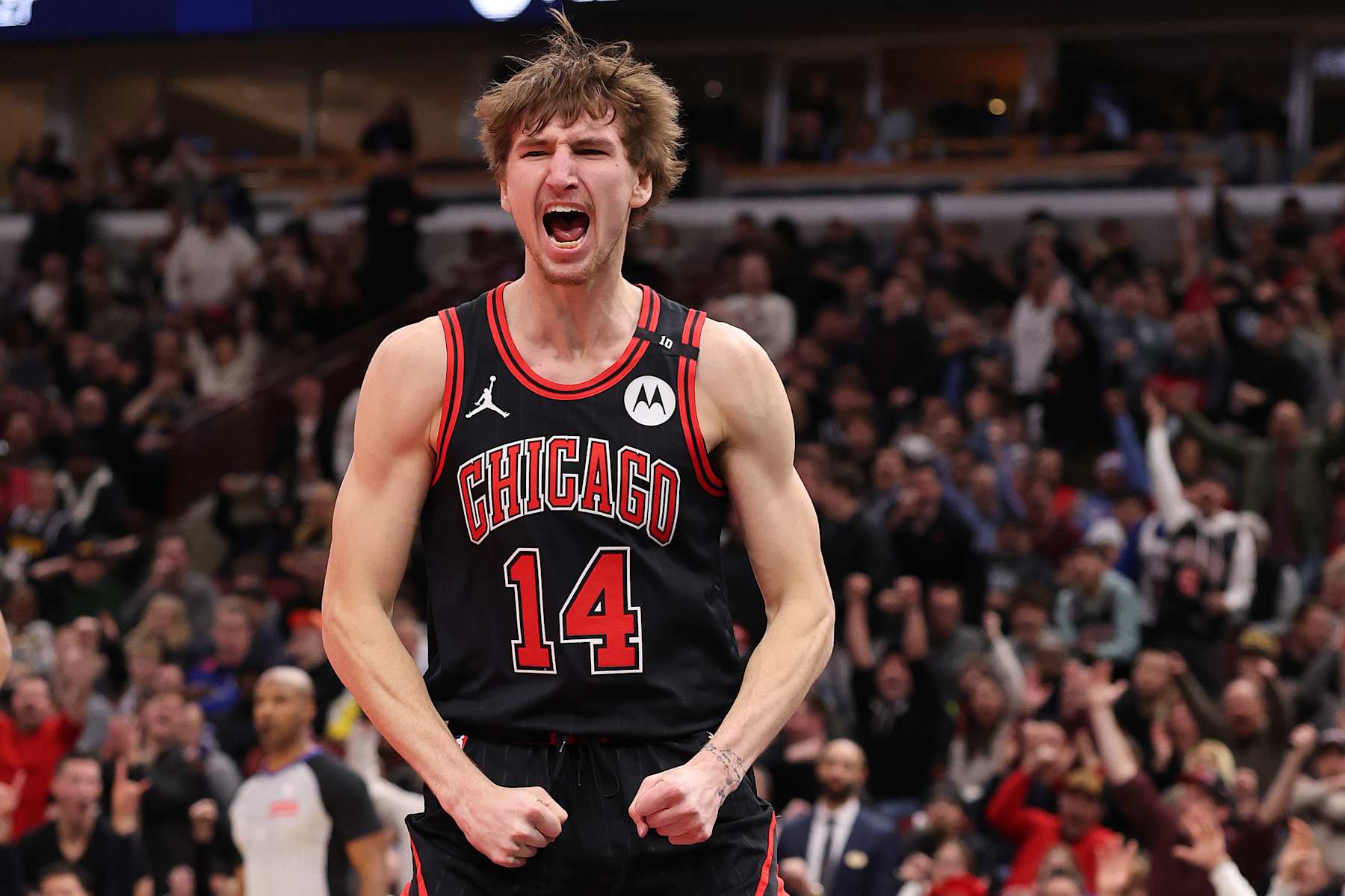 CHICAGO, ILLINOIS - JANUARY 27: Matas Buzelis #14 of the Chicago Bulls celebrates a dunk against the Denver Nuggets during the second half at the United Center on January 27, 2025 in Chicago, Illinois. NOTE TO USER: User expressly acknowledges and agrees that, by downloading and or using this photograph, User is consenting to the terms and conditions of the Getty Images License Agreement.  (Photo by Michael Reaves/Getty Images)