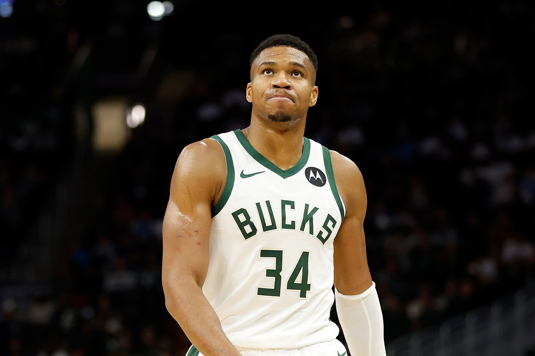 MILWAUKEE, WISCONSIN - OCTOBER 20: Giannis Antetokounmpo #34 of the Milwaukee Bucks reacts after missing a pass under the basket during the preseason game against the Memphis Grizzlies at Fiserv Forum on October 20, 2023 in Milwaukee, Wisconsin. NOTE TO USER: User expressly acknowledges and agrees that, by downloading and or using this photograph, User is consenting to the terms and conditions of the Getty Images License Agreement. (Photo by John Fisher/Getty Images)