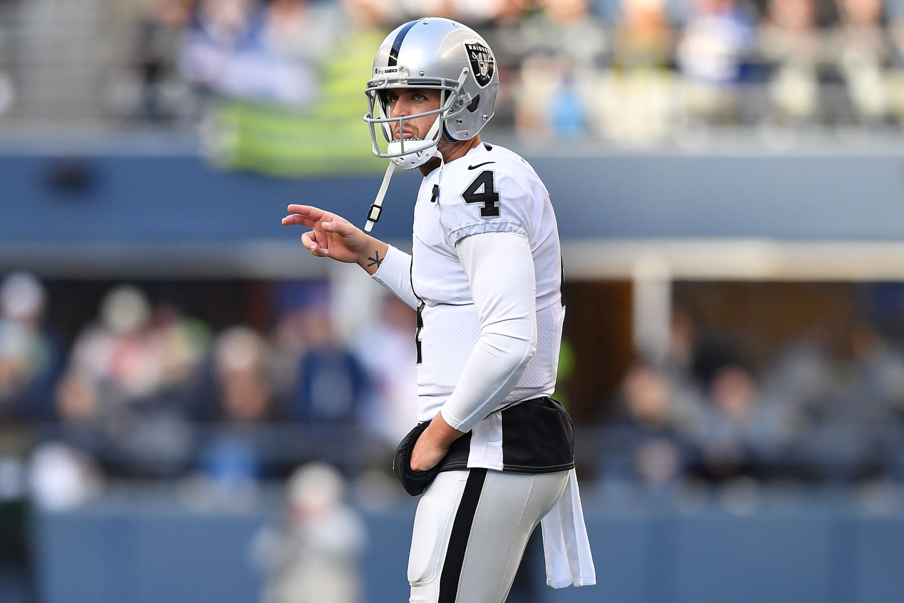 SEATTLE, WASHINGTON - NOVEMBER 27: Derek Carr #4 of the Las Vegas Raiders on the field during the first half in the game against the Seattle Seahawks at Lumen Field on November 27, 2022 in Seattle, Washington. (Photo by Jane Gershovich/Getty Images)