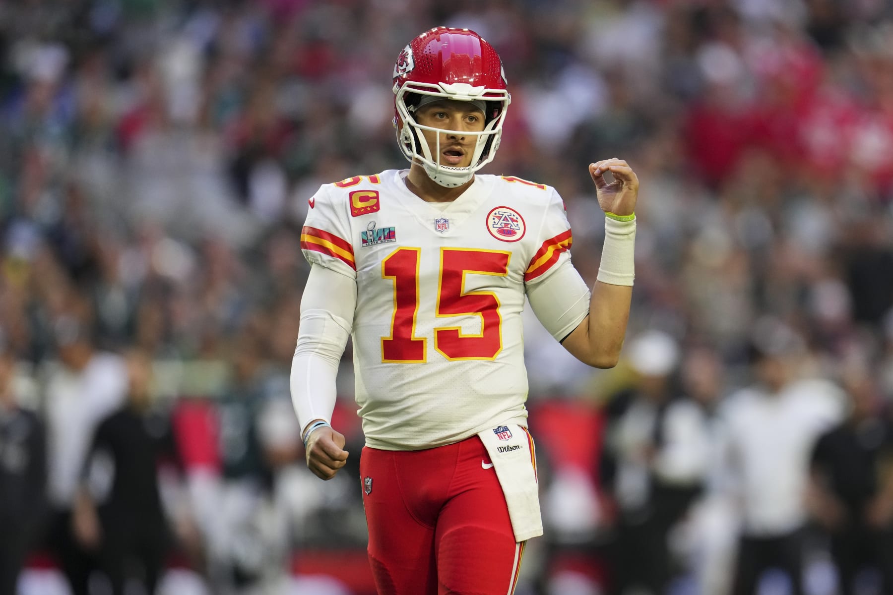 GLENDALE, AZ - FEBRUARY 12: Patrick Mahomes #15 of the Kansas City Chiefs motions against the Philadelphia Eagles during the first quarter in Super Bowl LVII at State Farm Stadium on February 12, 2023 in Glendale, Arizona. (Photo by Cooper Neill/Getty Images)