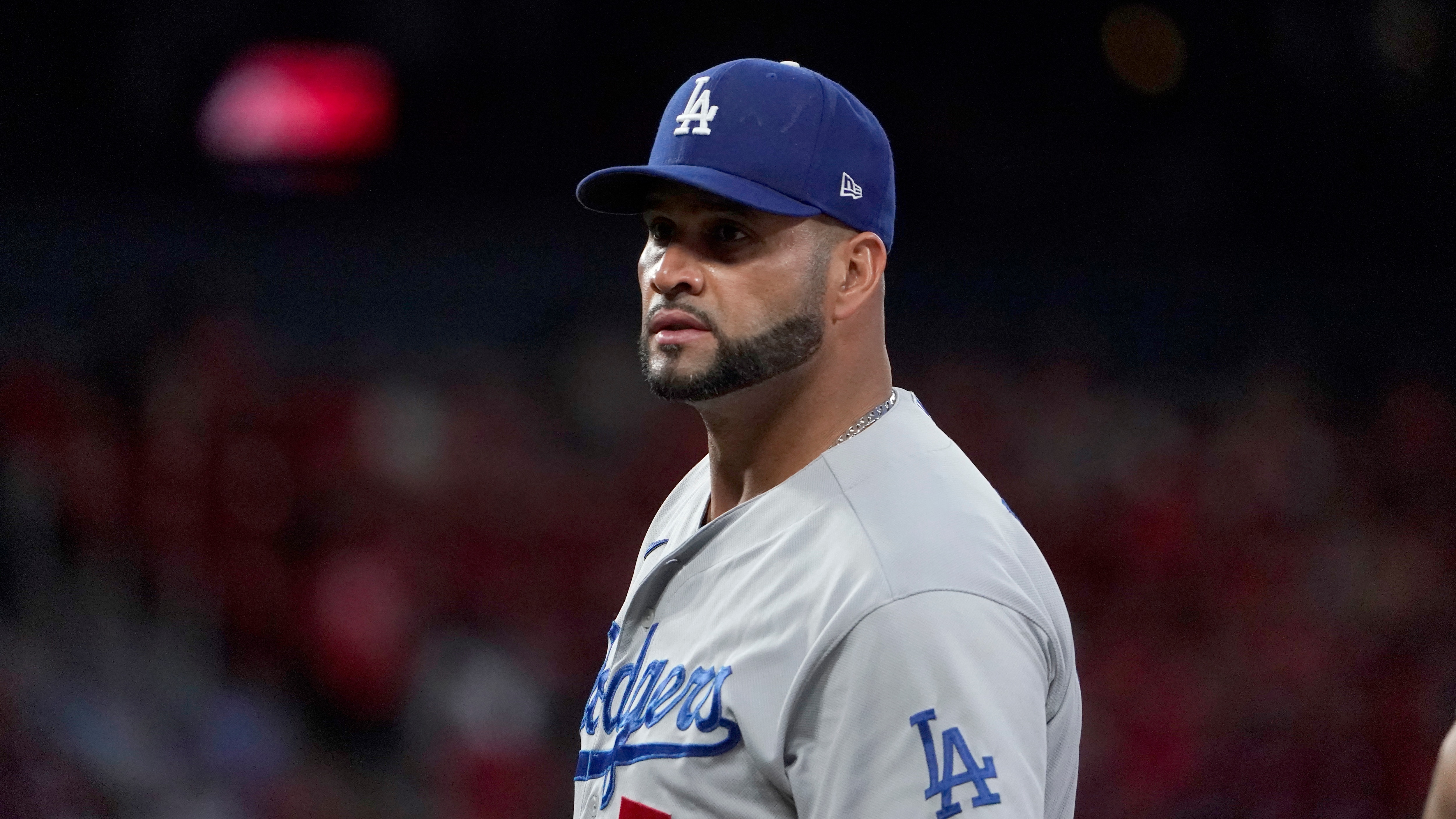 Los Angeles Dodgers first baseman Albert Pujols takes up his position during the second inning of a baseball game against the St. Louis Cardinals Wednesday, Sept. 8, 2021, in St. Louis. (AP Photo/Jeff Roberson)