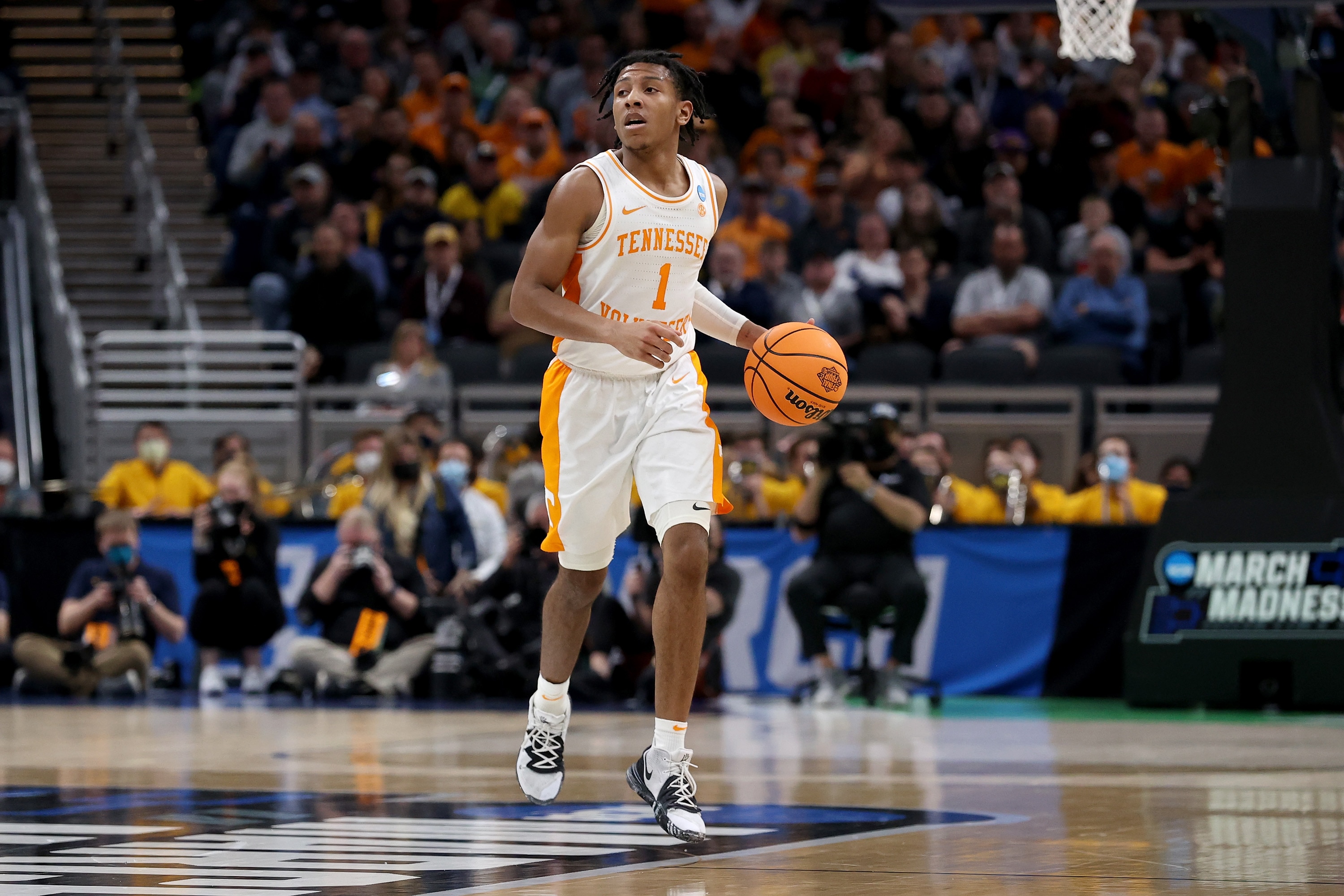 INDIANAPOLIS, INDIANA - MARCH 19: Kennedy Chandler #1 of the Tennessee Volunteers dribbles the ball during the game against the Michigan Wolverines during the second round of the 2022 NCAA Men's Basketball Tournament at Gainbridge Fieldhouse on March 19, 2022 in Indianapolis, Indiana. (Photo by Dylan Buell/Getty Images)