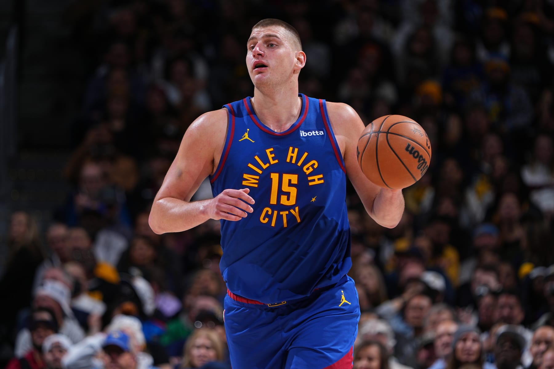 DENVER, CO - JANUARY 12: Nikola Jokic #15 of the Denver Nuggets dribbles the ball during the game against the New Orleans Pelicans  on January 12, 2024 at the Ball Arena in Denver, Colorado. NOTE TO USER: User expressly acknowledges and agrees that, by downloading and/or using this Photograph, user is consenting to the terms and conditions of the Getty Images License Agreement. Mandatory Copyright Notice: Copyright 2024 NBAE (Photo by Garrett Ellwood/NBAE via Getty Images)