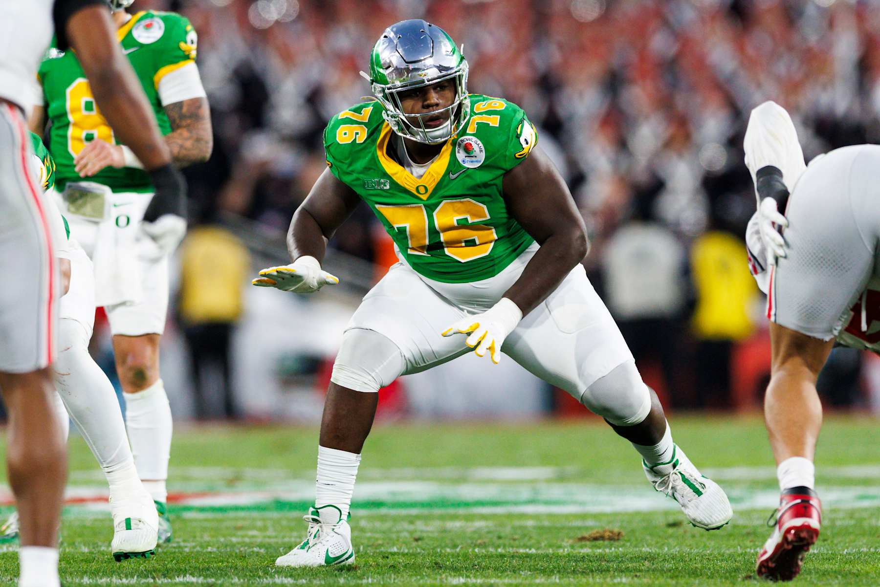PASADENA, CALIFORNIA - JANUARY 1: Josh Conerly Jr. #76 of the Oregon Ducks blocks in the second half during the Rose Bowl against Ohio State Buckeyes at Rose Bowl Stadium on January 1, 2025 in Pasadena, California. (Photo by Ric Tapia/Getty Images)