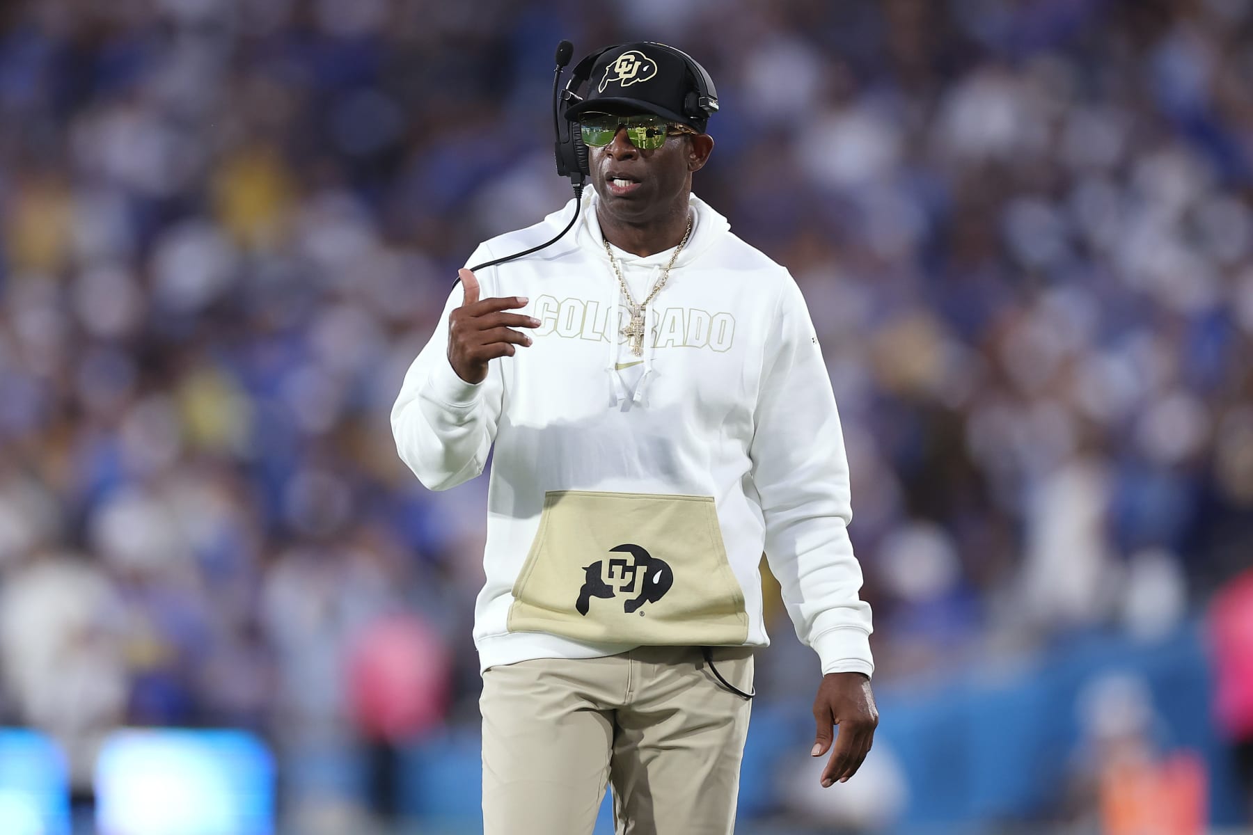 PASADENA, CALIFORNIA - OCTOBER 28: Head coach Deion Sanders of the Colorado Buffaloes looks on from the sidelines during the first half of a game against the UCLA Bruins at Rose Bowl Stadium on October 28, 2023 in Pasadena, California. (Photo by Sean M. Haffey/Getty Images) PASADENA, CALIFORNIA - OCTOBER 28: Head coach Deion Sanders of the Colorado Buffaloes looks on from the sidelines during the first half of a game against the UCLA Bruins at Rose Bowl Stadium on October 28, 2023 in Pasadena, California. (Photo by Sean M. Haffey/Getty Images)
