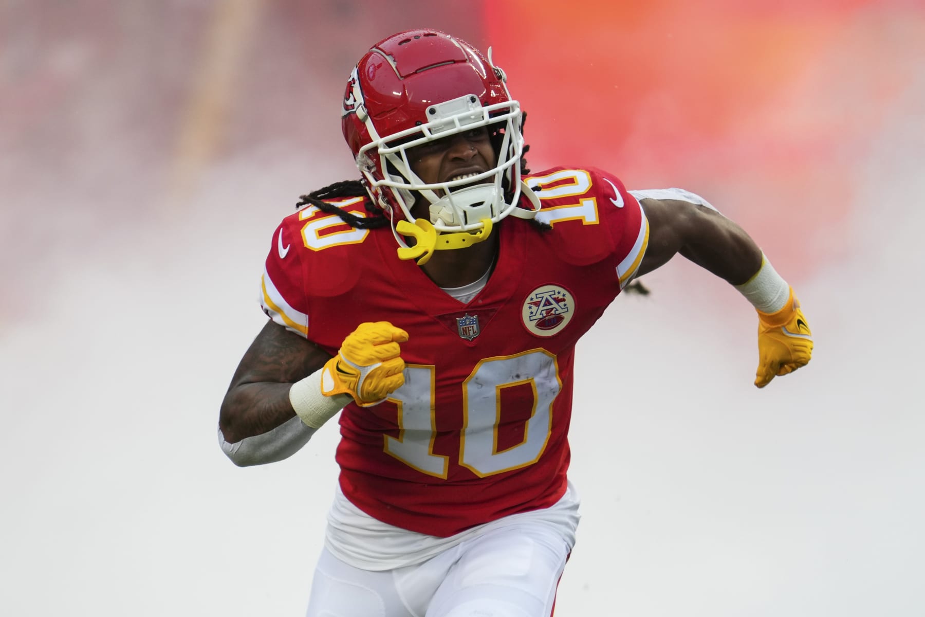 KANSAS CITY, MO - JANUARY 21: Isiah Pacheco #10 of the Kansas City Chiefs runs onto the field during introductions against the Jacksonville Jaguars at GEHA Field at Arrowhead Stadium on January 21, 2023 in Kansas City, Missouri. (Photo by Cooper Neill/Getty Images)