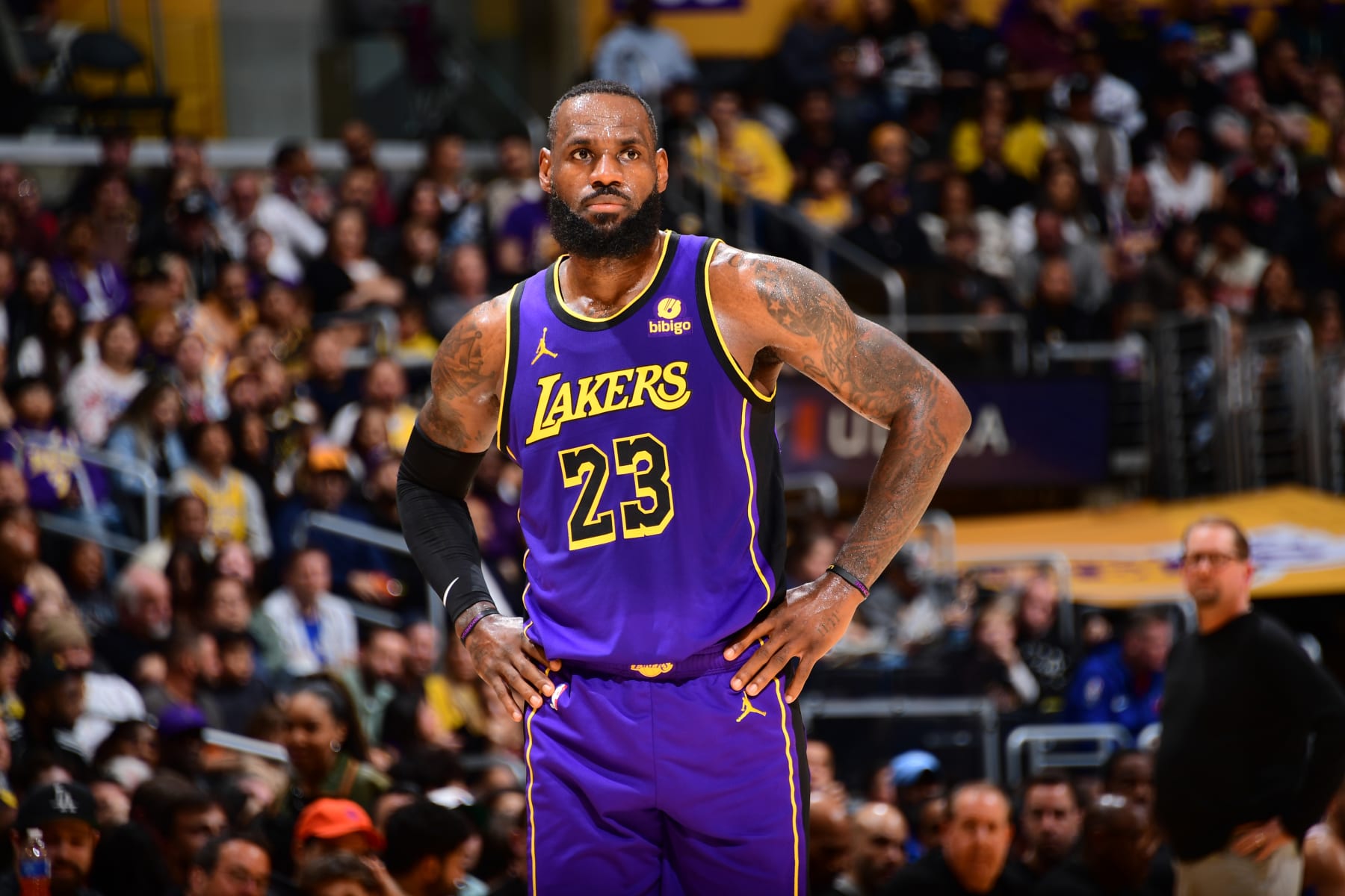 LOS ANGELES, CA - MARCH 22: LeBron James #23 of the Los Angeles Lakers looks on during the game against the Philadelphia 76ers on March 22, 2024 at Crypto.Com Arena in Los Angeles, California. NOTE TO USER: User expressly acknowledges and agrees that, by downloading and/or using this Photograph, user is consenting to the terms and conditions of the Getty Images License Agreement. Mandatory Copyright Notice: Copyright 2024 NBAE (Photo by Adam Pantozzi/NBAE via Getty Images)