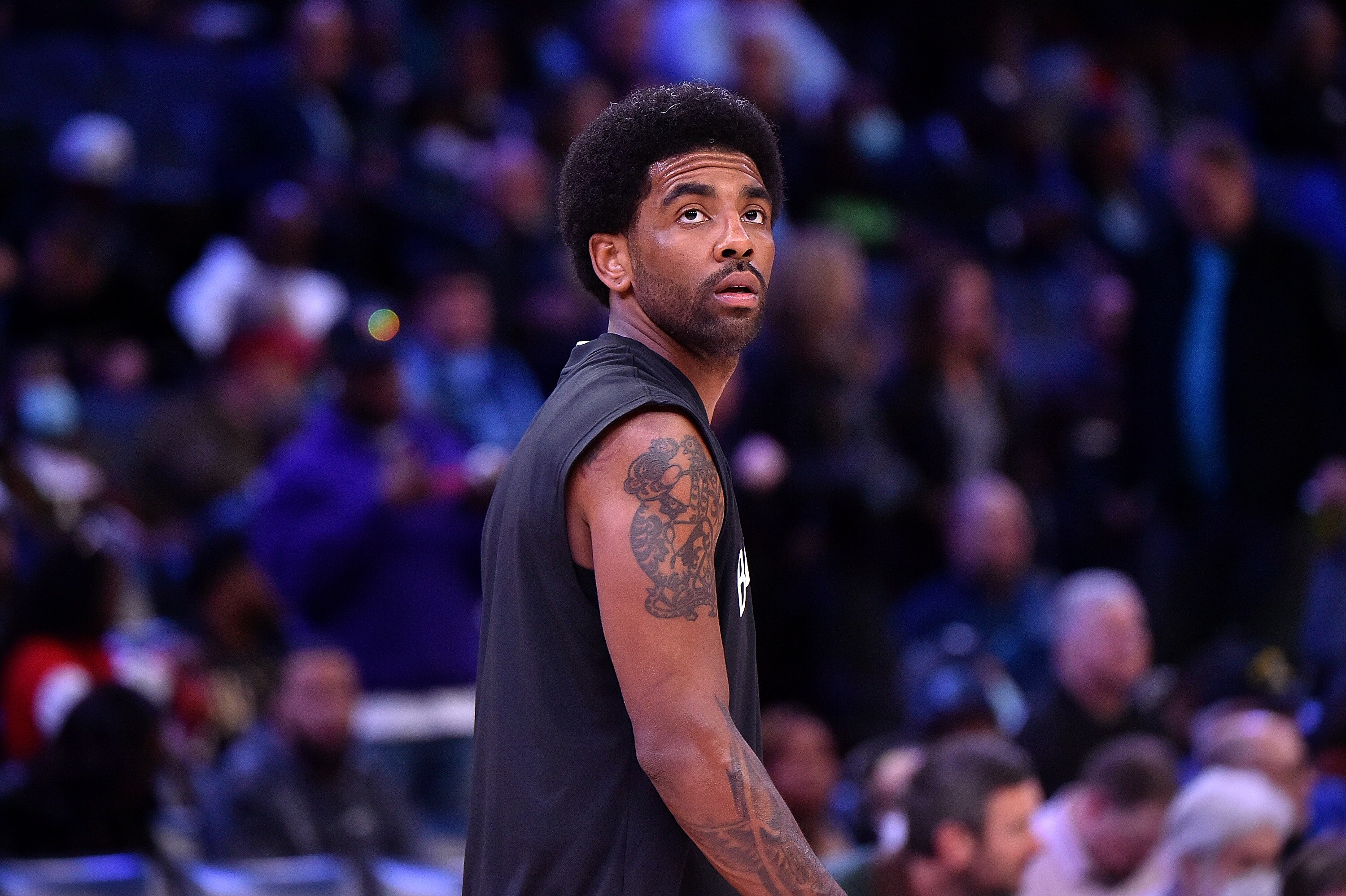 MEMPHIS, TENNESSEE - MARCH 23: Kyrie Irving #11 of the Brooklyn Nets warms up before the game against the Memphis Grizzlies at FedExForum on March 23, 2022 in Memphis, Tennessee. NOTE TO USER: User expressly acknowledges and agrees that , by downloading and or using this photograph, User is consenting to the terms and conditions of the Getty Images License Agreement. (Photo by Justin Ford/Getty Images)