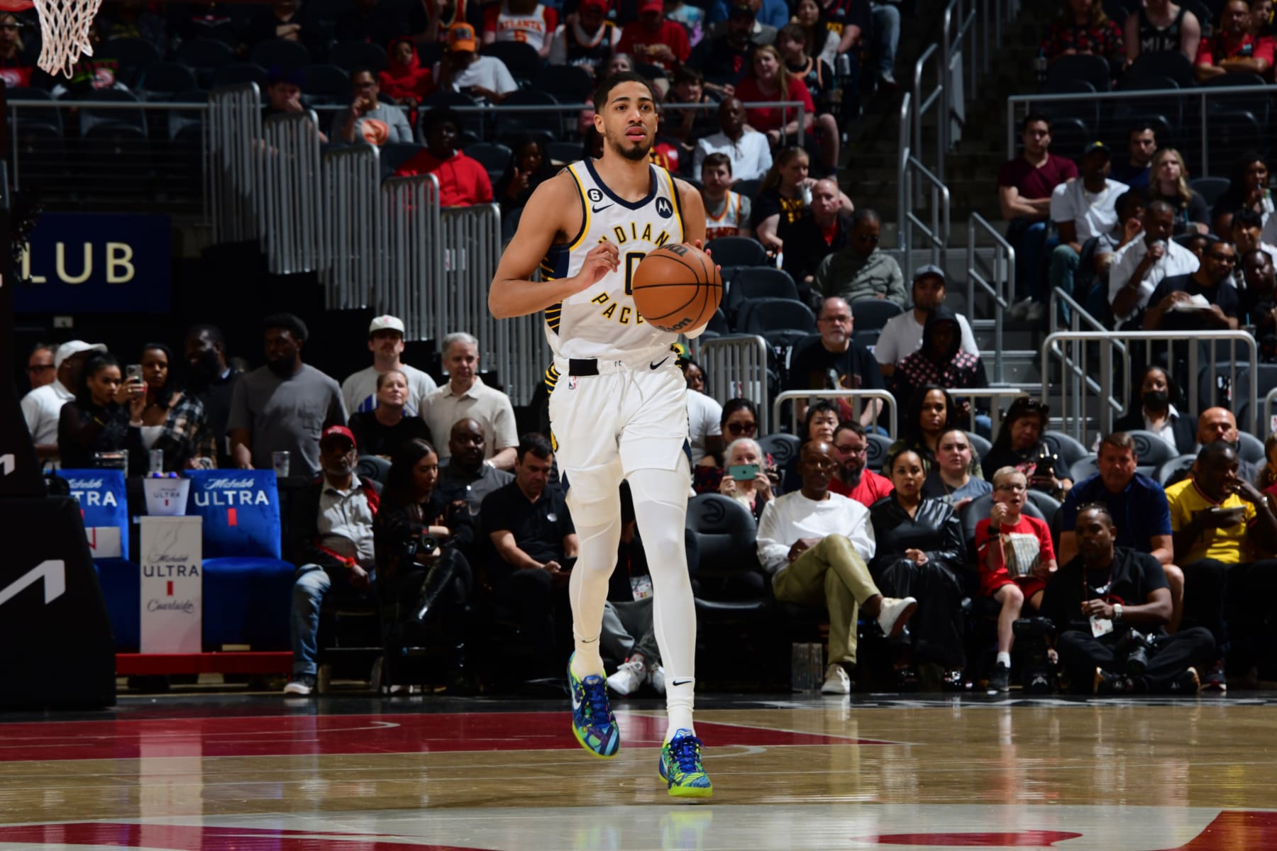 ATLANTA, GA - MARCH 25: Tyrese Haliburton #0 of the Indiana Pacers dribbles the ball during the game against the Atlanta Hawks on March 25, 2023 at State Farm Arena in Atlanta, Georgia.  NOTE TO USER: User expressly acknowledges and agrees that, by downloading and/or using this Photograph, user is consenting to the terms and conditions of the Getty Images License Agreement. Mandatory Copyright Notice: Copyright 2023 NBAE (Photo by Scott Cunningham/NBAE via Getty Images)