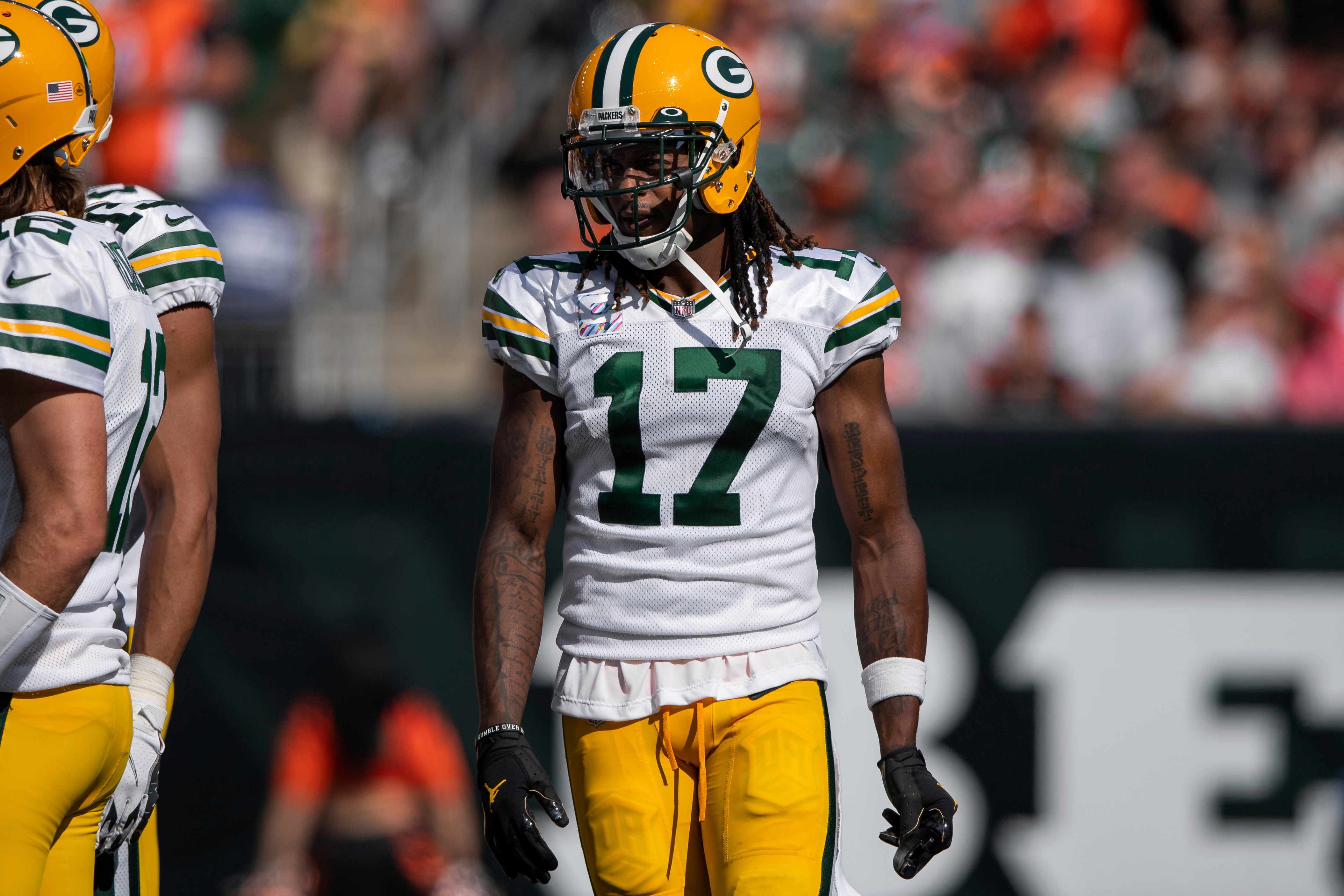 Green Bay Packers wide receiver Davante Adams (17) walks to the offensive huddle during an NFL football game against the Cincinnati Bengals, Sunday, Oct. 10, 2021, in Cincinnati. (AP Photo/Zach Bolinger)