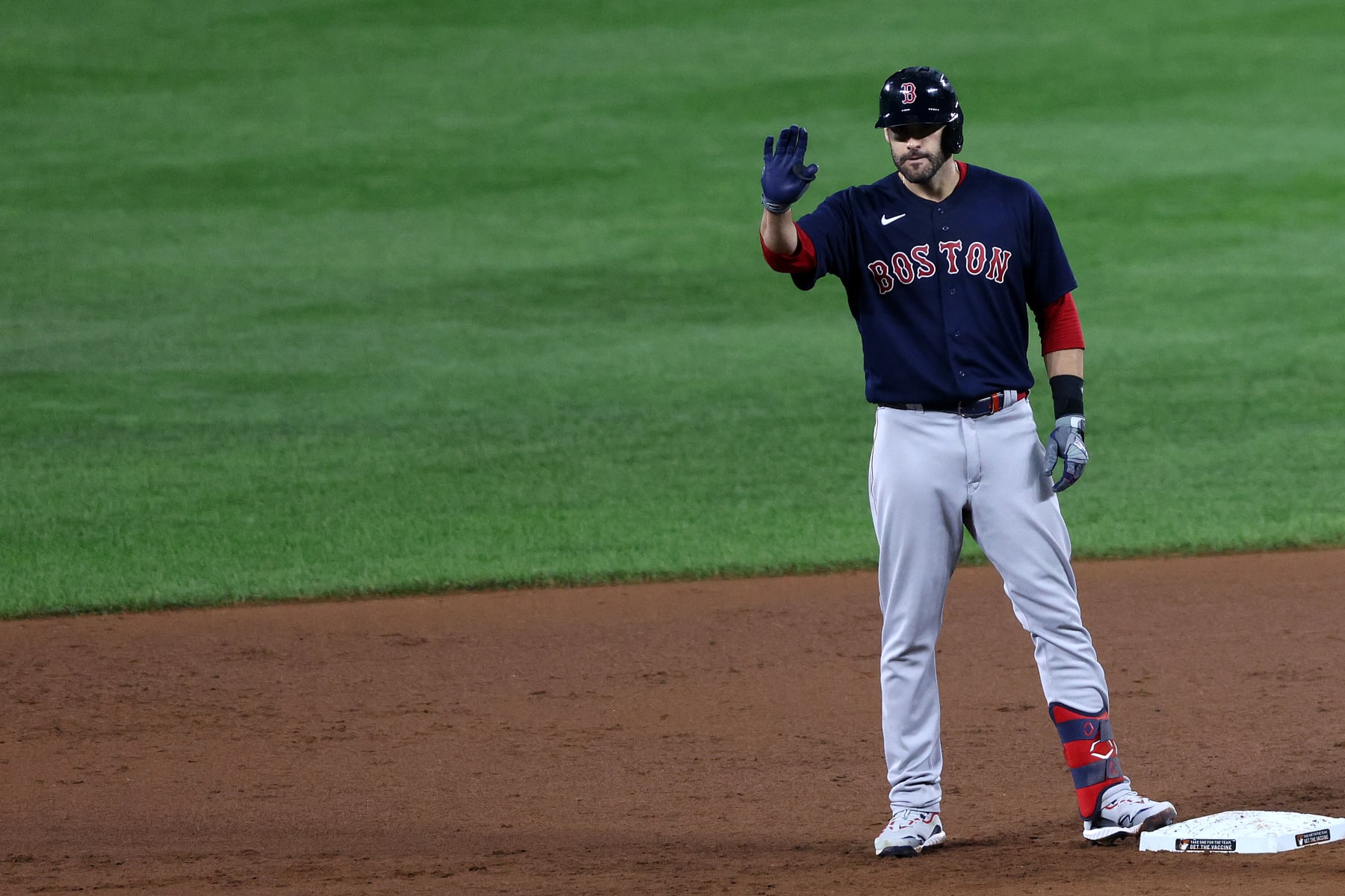 BALTIMORE, MARYLAND - SEPTEMBER 29: J.D. Martinez #28 of the Boston Red Sox waves to the dugout after hitting a two RBI double against the Baltimore Orioles in the sixth inning at Oriole Park at Camden Yards on September 29, 2021 in Baltimore, Maryland. (Photo by Rob Carr/Getty Images)