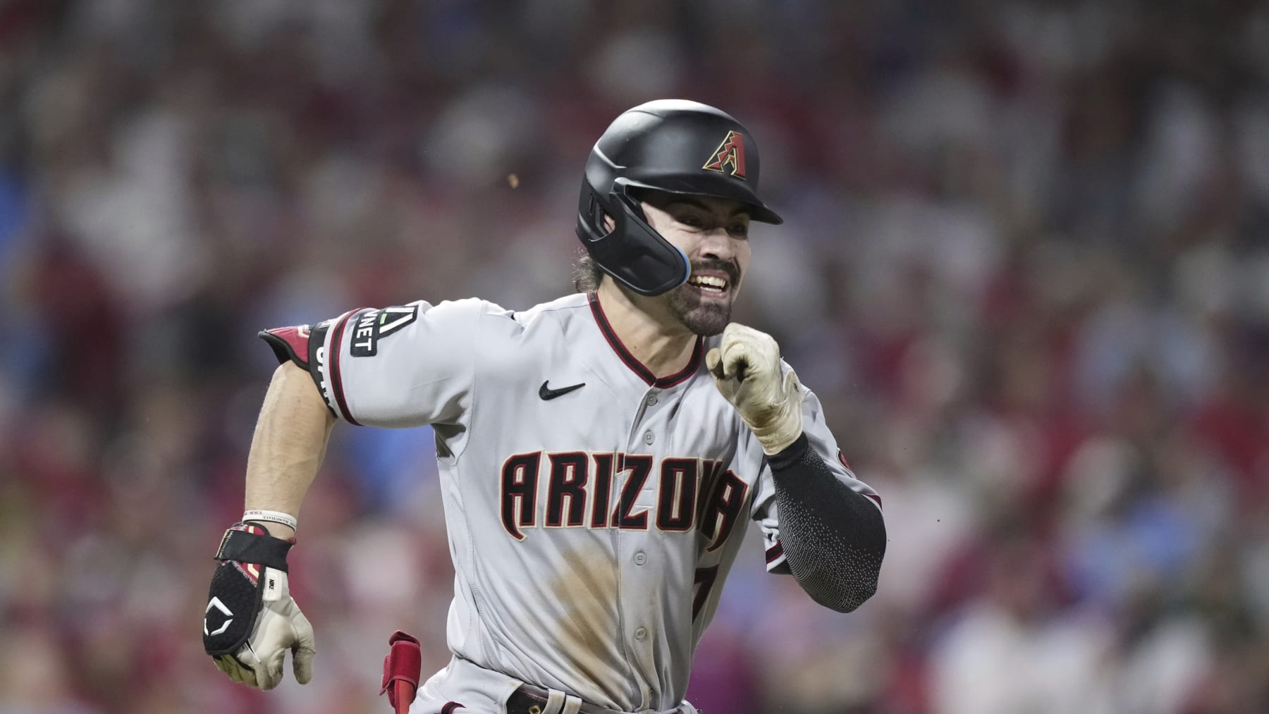 Arizona Diamondbacks' Corbin Carroll runs to first during the third inning in Game 2 of the baseball NL Championship Series in Philadelphia, Tuesday, Oct. 17, 2023. (AP Photo/Matt Slocum)