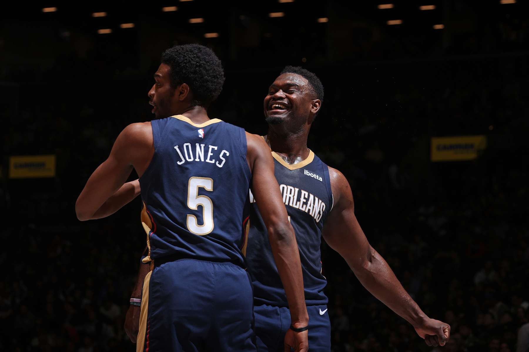 BROOKLYN, NY - MARCH 19: Herb Jones #5 and Zion Williamson #1 of the New Orleans Pelicans celebrate during the game against the Brooklyn Nets on March 19, 2024 at Barclays Center in Brooklyn, New York. NOTE TO USER: User expressly acknowledges and agrees that, by downloading and or using this Photograph, user is consenting to the terms and conditions of the Getty Images License Agreement. Mandatory Copyright Notice: Copyright 2024 NBAE (Photo by Nathaniel S. Butler/NBAE via Getty Images)