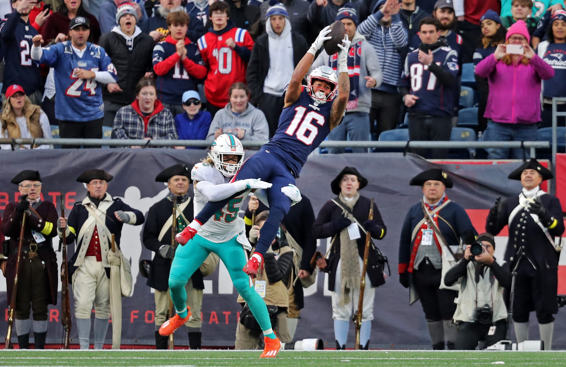 Foxborough, MA - January 1: New England Patriots WR Jakobi Meyers goes up high to catch a fourth quarter touchdown. The Patriots defeated the Miami Dolphins, 23-21. (Photo by Jim Davis/The Boston Globe via Getty Images)