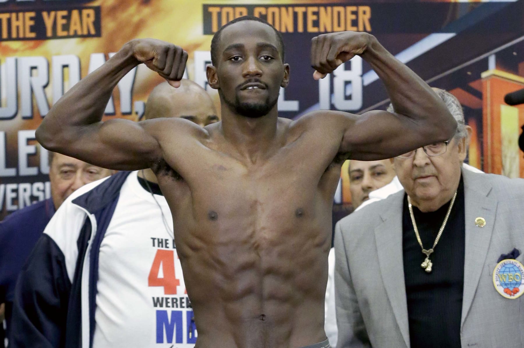 Boxer Terence Crawford flexes as he is weighed-in Friday, April 17, 2015, in Grapevine, Texas. Crawford will fight Thomas Dulorme for the vacant WBO junior welterweight title at College Park Center located on the campus of the University of Texas Arlington on Saturday. (AP Photo/LM Otero)