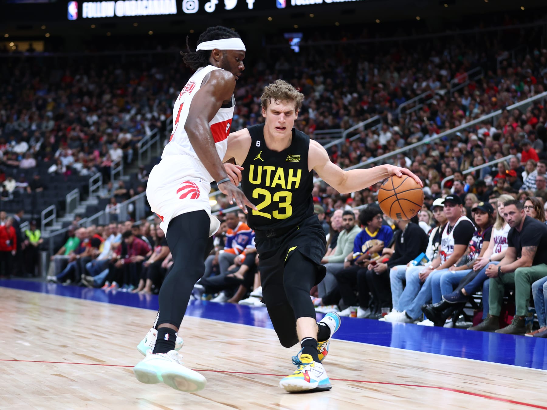ALBERTA, CANADA - OCTOBER 2: Lauri Markkanen #23 of the Utah Jazz drives to the basket during the game against the Toronto Raptors  on October 2, 2022 at the Rogers Place in Edmonton, Alberta, Canada.  NOTE TO USER: User expressly acknowledges and agrees that, by downloading and or using this Photograph, user is consenting to the terms and conditions of the Getty Images License Agreement.  Mandatory Copyright Notice: Copyright 2022 NBAE (Photo by Vaughn Ridley/NBAE via Getty Images)