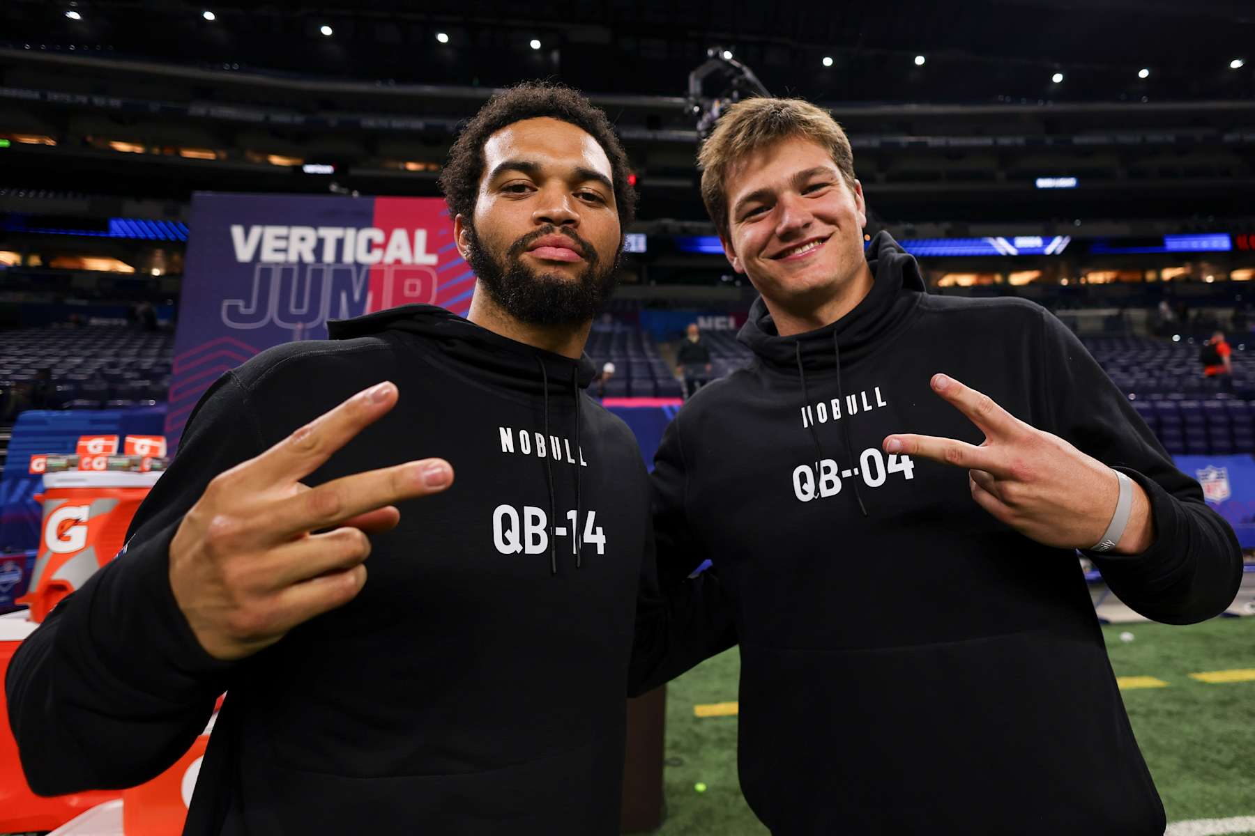 INDIANAPOLIS, INDIANA - MARCH 2: Caleb Williams #QB14 of Southern California takes a picture with Drake Maye #QB04 of North Carolina during the NFL scouting combine at Lucas Oil Stadium on March 2, 2024 in Indianapolis, Indiana. (Photo by Kara Durrette/Getty Images)