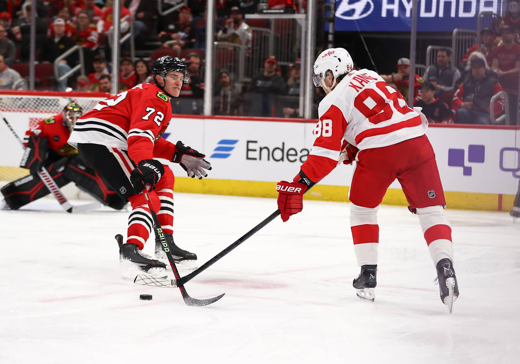 Alex Vlasic and Patrick Kane.