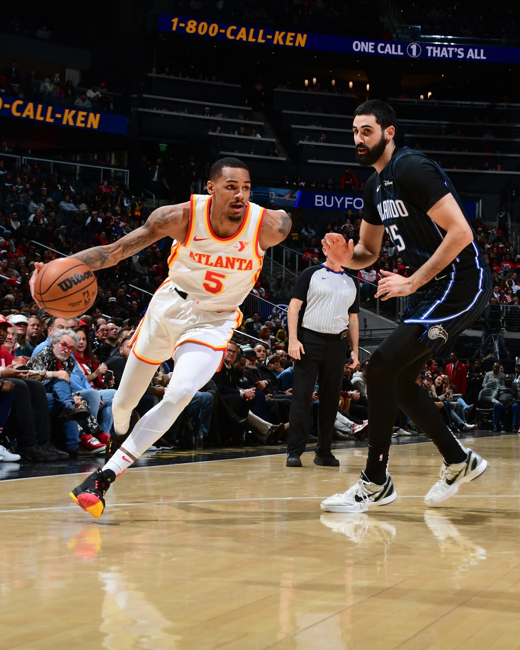 ATLANTA, GA - JANUARY 17: Dejounte Murray #5 of the Atlanta Hawks goes to the basket during the game on January 17, 2024 at State Farm Arena in Atlanta, Georgia.  NOTE TO USER: User expressly acknowledges and agrees that, by downloading and/or using this Photograph, user is consenting to the terms and conditions of the Getty Images License Agreement. Mandatory Copyright Notice: Copyright 2024 NBAE (Photo by Scott Cunningham/NBAE via Getty Images)