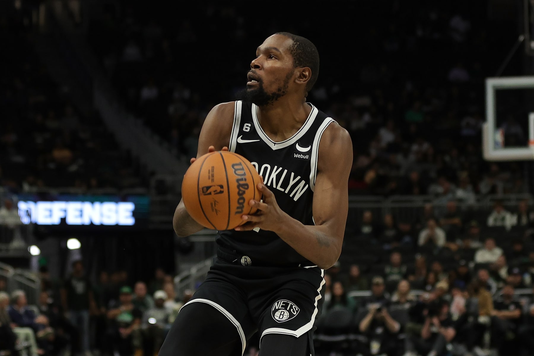 MILWAUKEE, WISCONSIN - OCTOBER 12: Kevin Durant #7 of the Brooklyn Nets takes a shot during a preseason game against the Milwaukee Bucks at Fiserv Forum on October 12, 2022 in Milwaukee, Wisconsin. NOTE TO USER: User expressly acknowledges and agrees that, by downloading and or using this photograph, User is consenting to the terms and conditions of the Getty Images License Agreement. (Photo by Stacy Revere/Getty Images)