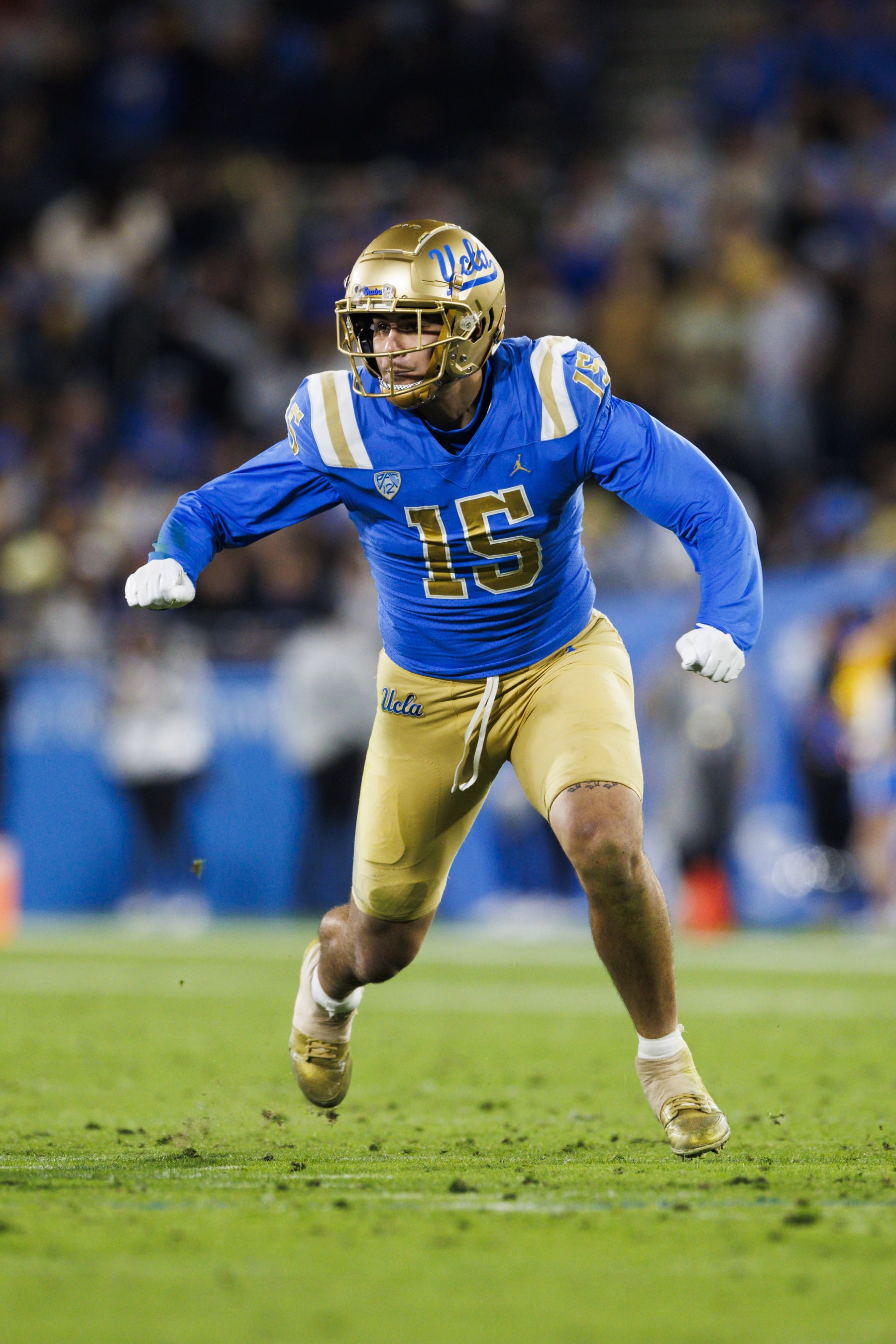 PASADENA, CA - NOVEMBER 25: UCLA Bruins defensive lineman Laiatu Latu (15) rushes the edge during a college football game against Cal Golden Bears on November 25, 2023 at Rose Bowl Stadium in Pasadena, CA. (Photo by Ric Tapia/Icon Sportswire via Getty Images)