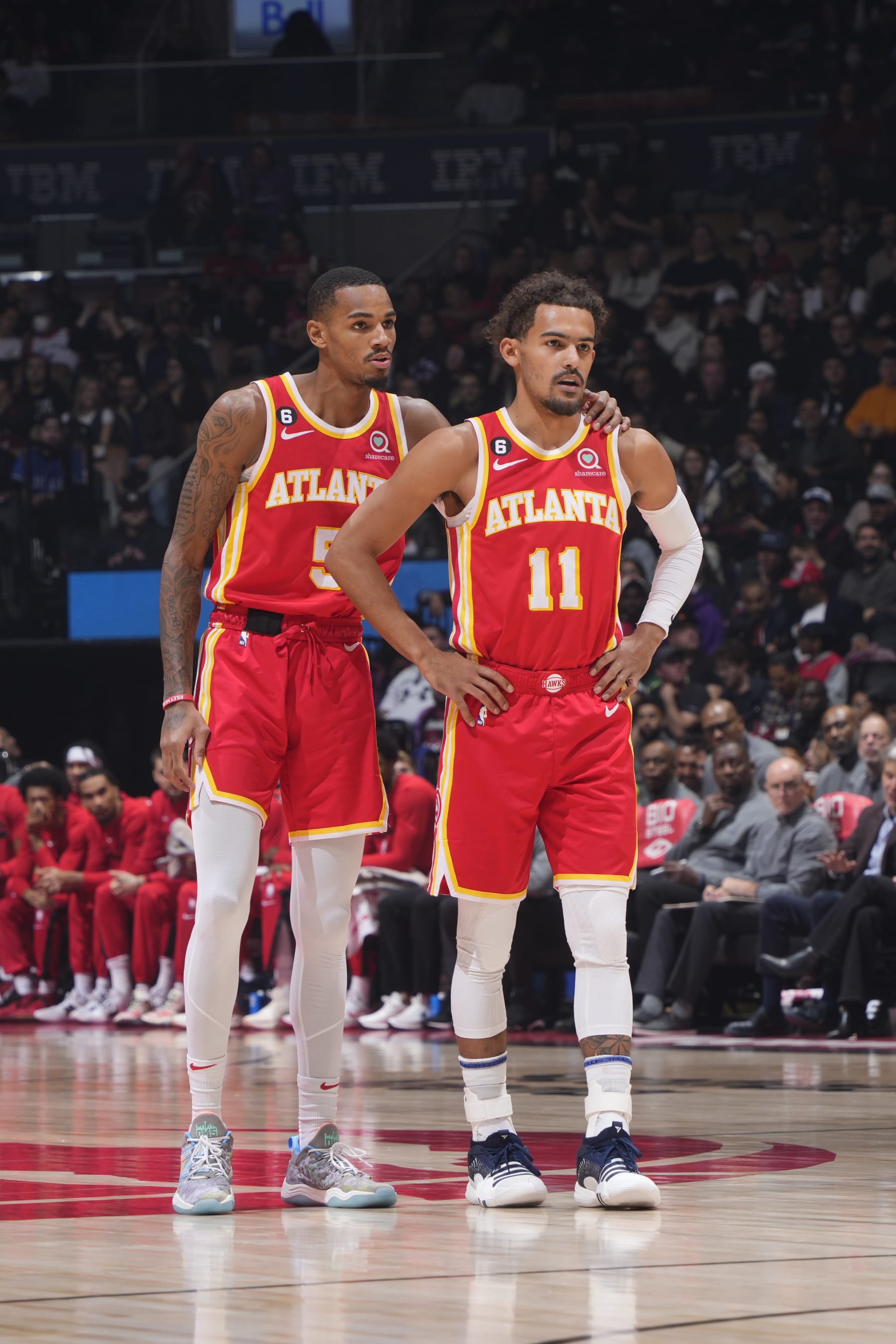 TORONTO, CANADA - OCTOBER 31: Dejounte Murray #5 of the Atlanta Hawks talks to Trae Young #11 during the game against the Toronto Raptors on October 31, 2022 at the Scotiabank Arena in Toronto, Ontario, Canada.  NOTE TO USER: User expressly acknowledges and agrees that, by downloading and or using this Photograph, user is consenting to the terms and conditions of the Getty Images License Agreement.  Mandatory Copyright Notice: Copyright 2022 NBAE (Photo by Mark Blinch/NBAE via Getty Images)